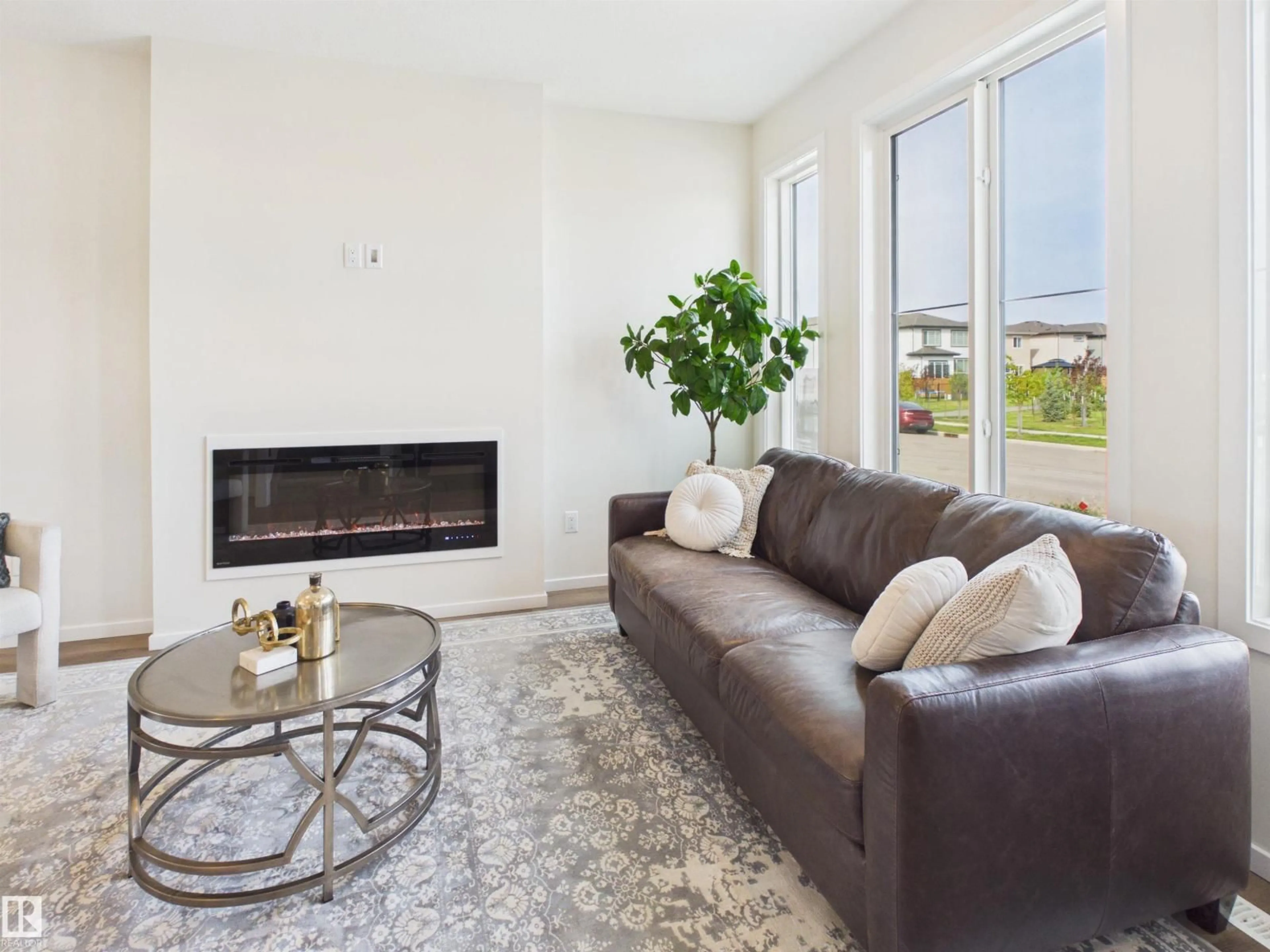 Living room with furniture, unknown for 87 SERENO LN, Fort Saskatchewan Alberta T8L0Z9