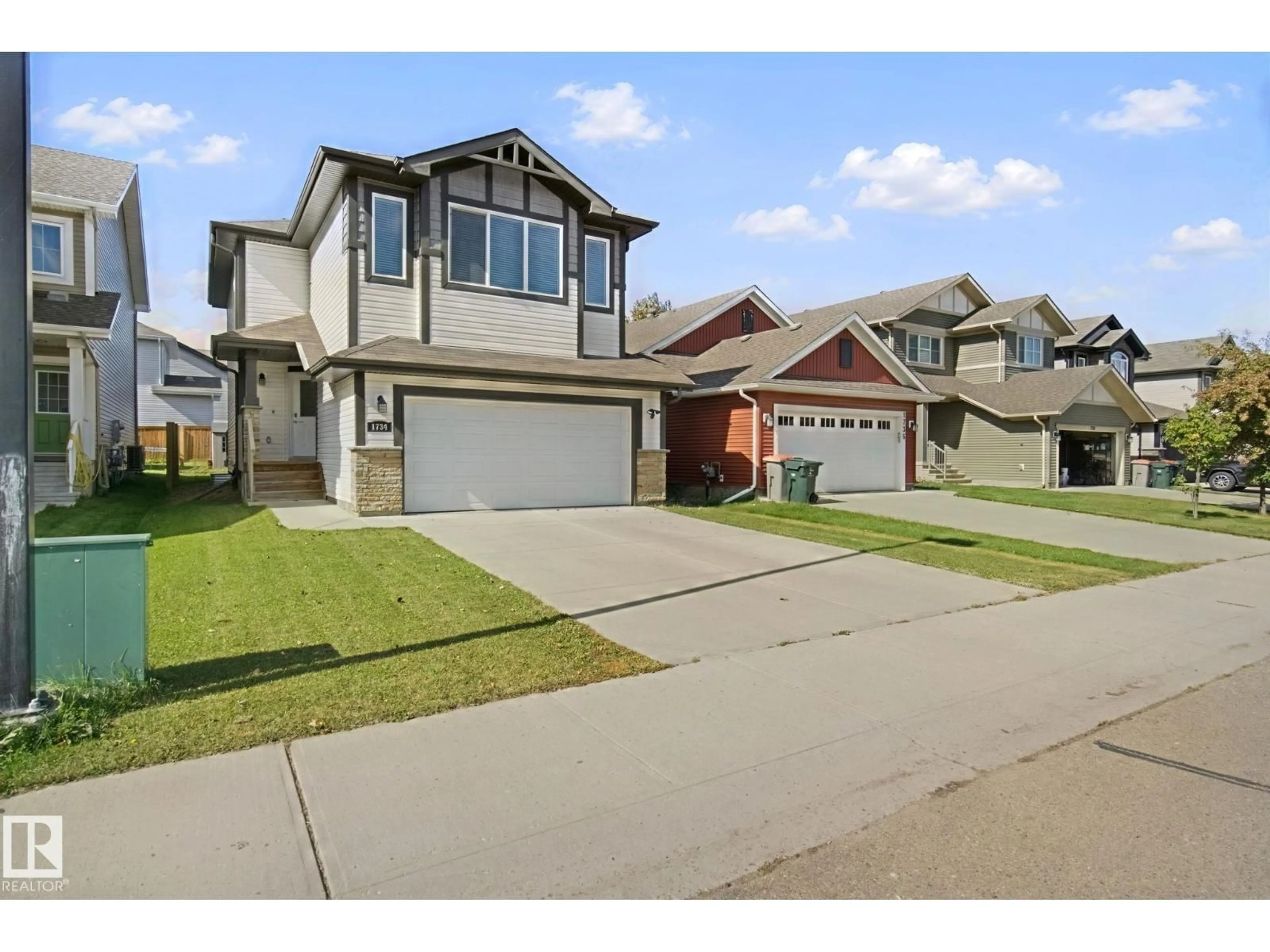 Home with vinyl exterior material, street for 1734 WESTERRA LO, Stony Plain Alberta T7Z0K8