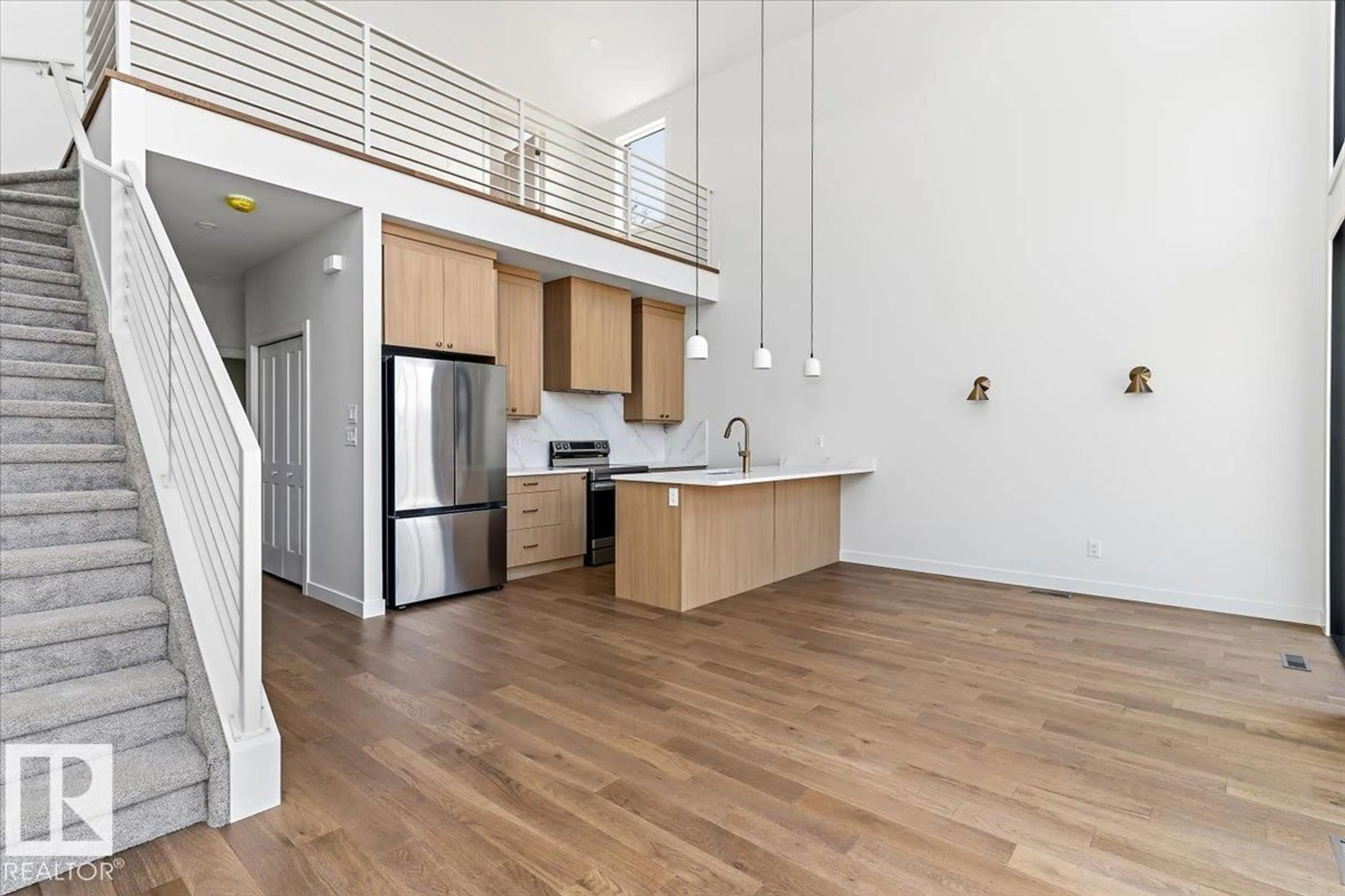 Open concept kitchen, wood/laminate floor for 186 RGE ROAD 212 A, Rural Strathcona County Alberta T8G1G1