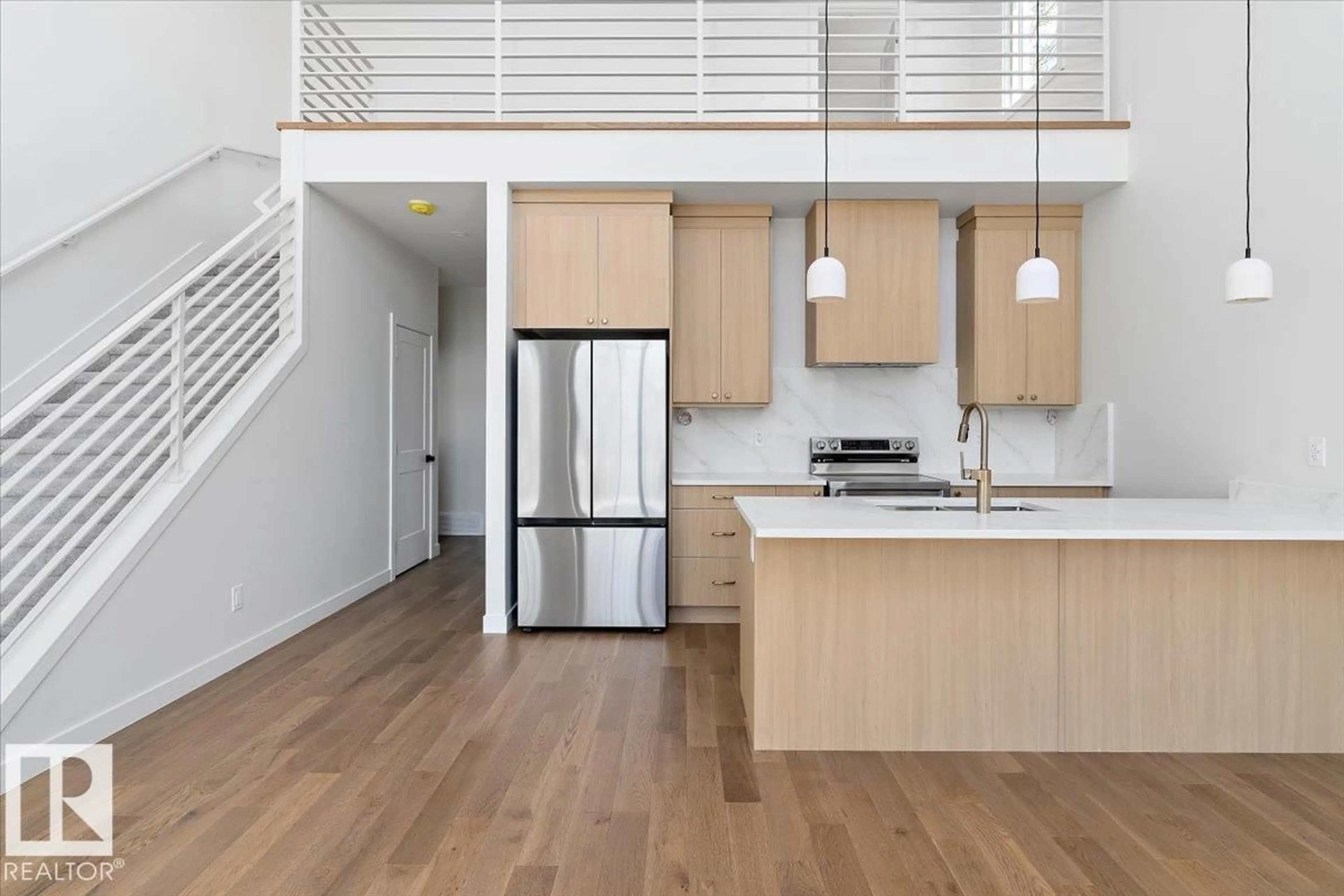 Open concept kitchen, wood/laminate floor for 186 RGE ROAD 212 A, Rural Strathcona County Alberta T8G1G1