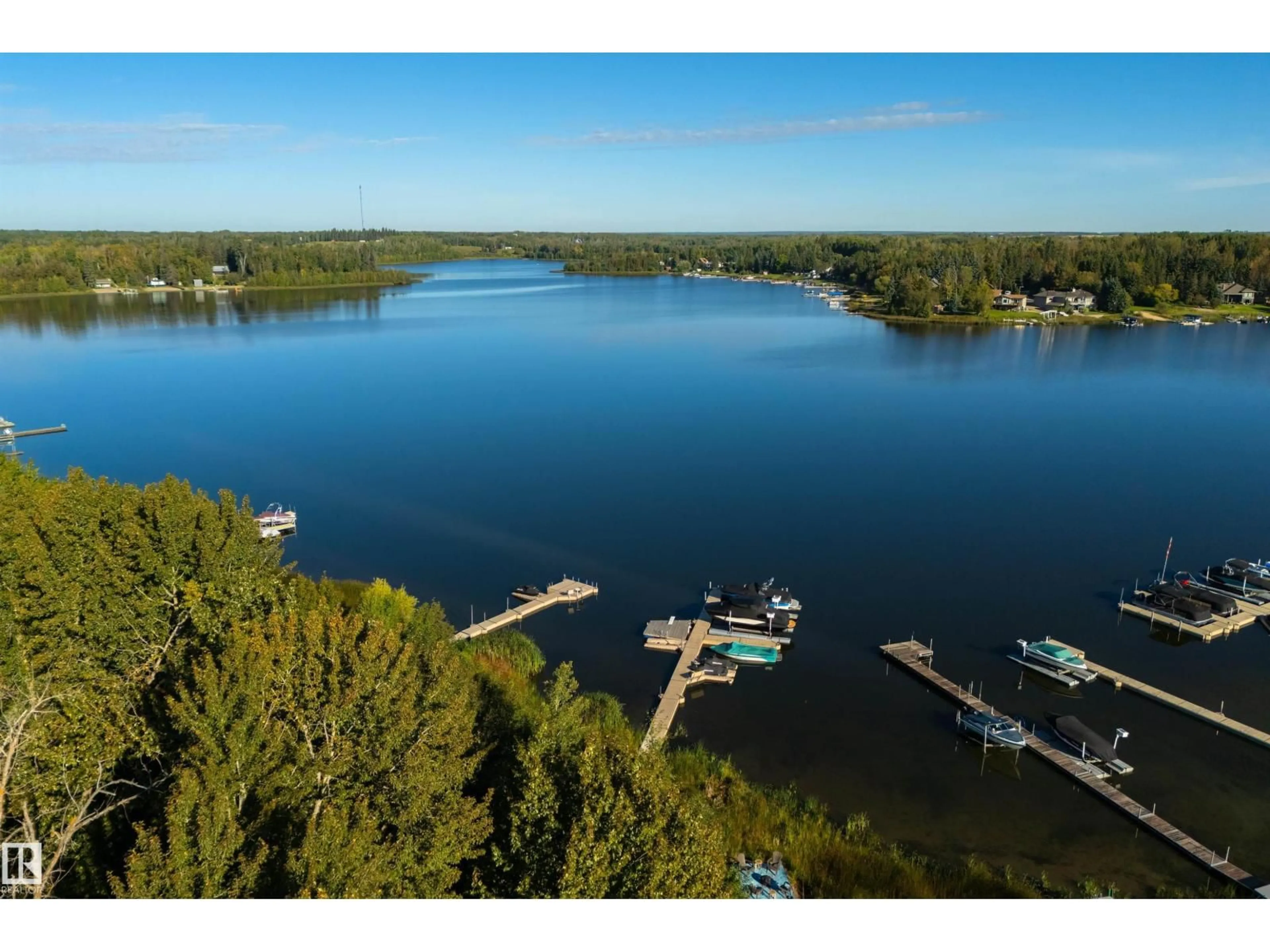 A pic from outside/outdoor area/front of a property/back of a property/a pic from drone, water/lake/river/ocean view for #9 - 2307 TWP ROAD 522, Rural Parkland County Alberta T7Y3L7