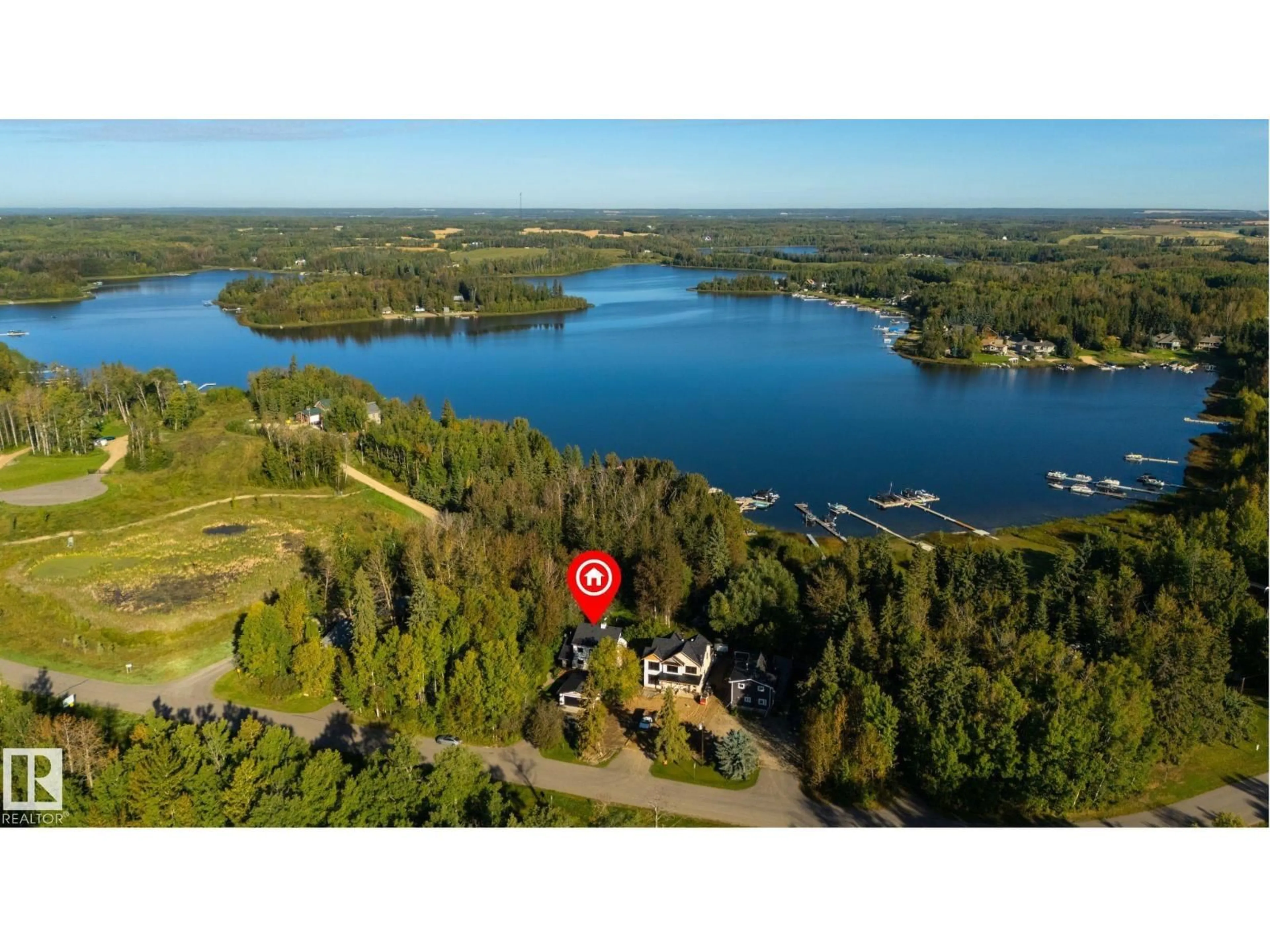 A pic from outside/outdoor area/front of a property/back of a property/a pic from drone, water/lake/river/ocean view for #9 - 2307 TWP ROAD 522, Rural Parkland County Alberta T7Y3L7