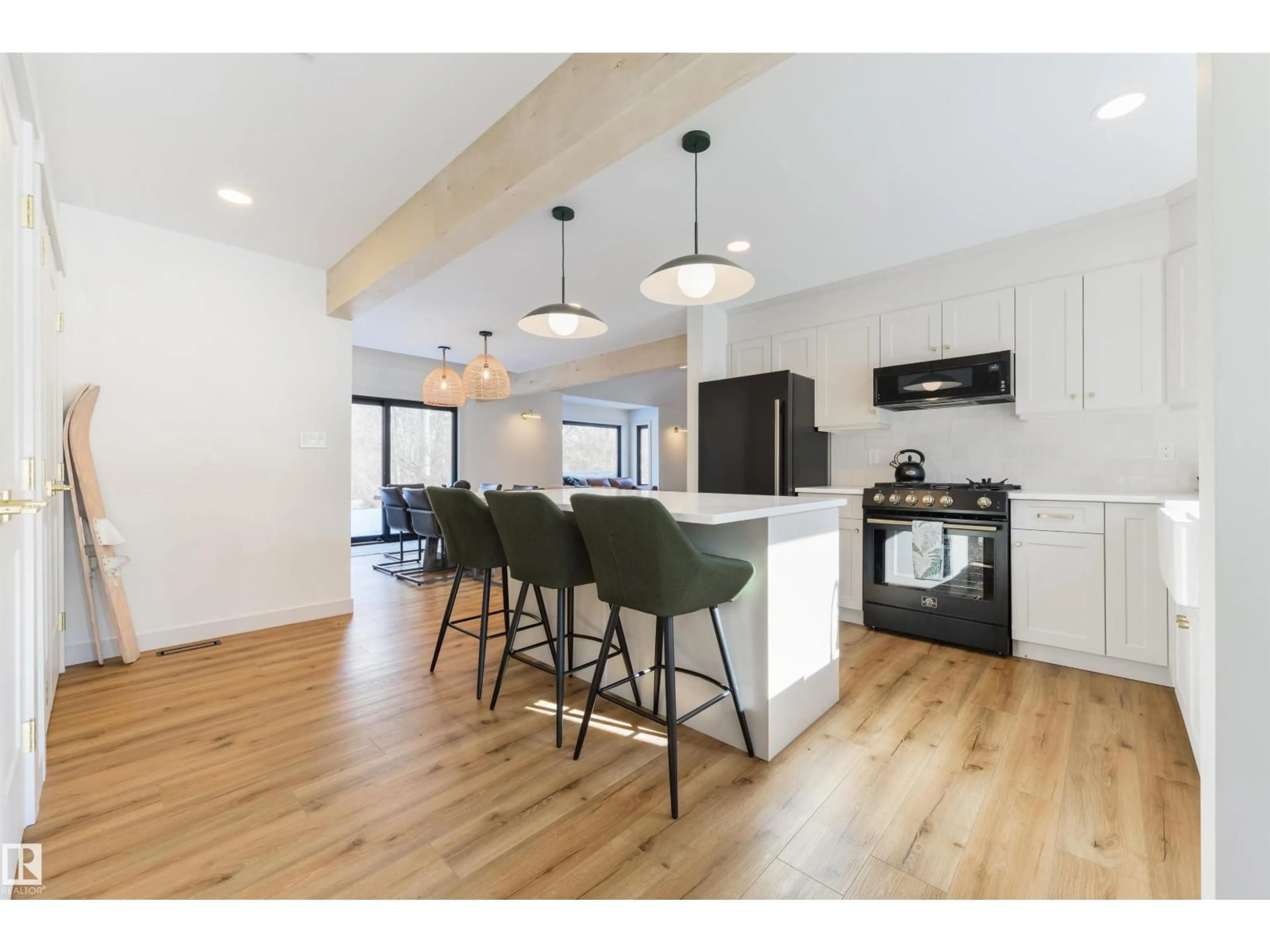 Open concept kitchen, wood/laminate floor for #9 - 2307 TWP ROAD 522, Rural Parkland County Alberta T7Y3L7