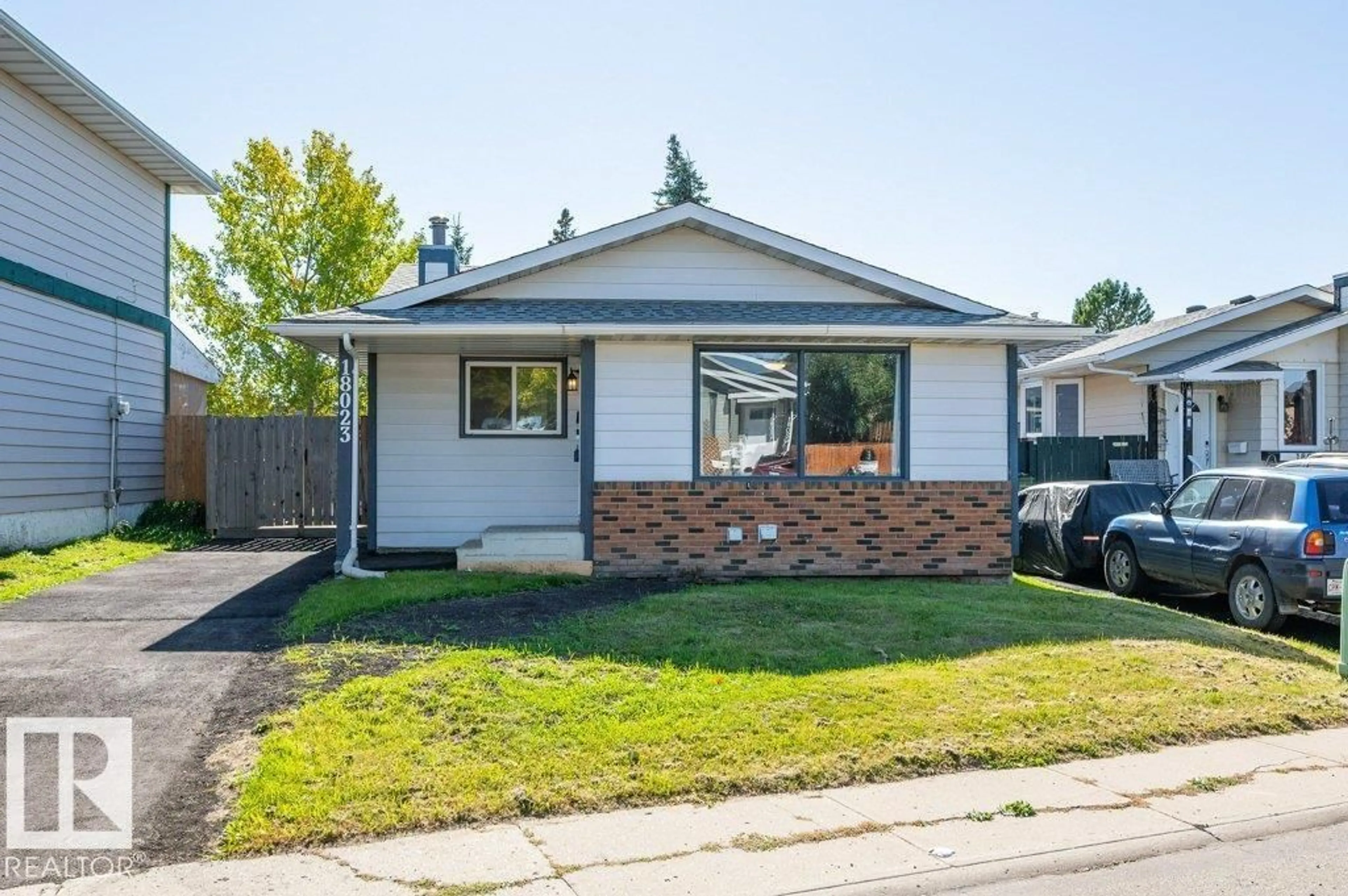 Home with vinyl exterior material, street for 18023 73 AV, Edmonton Alberta T5T3K2