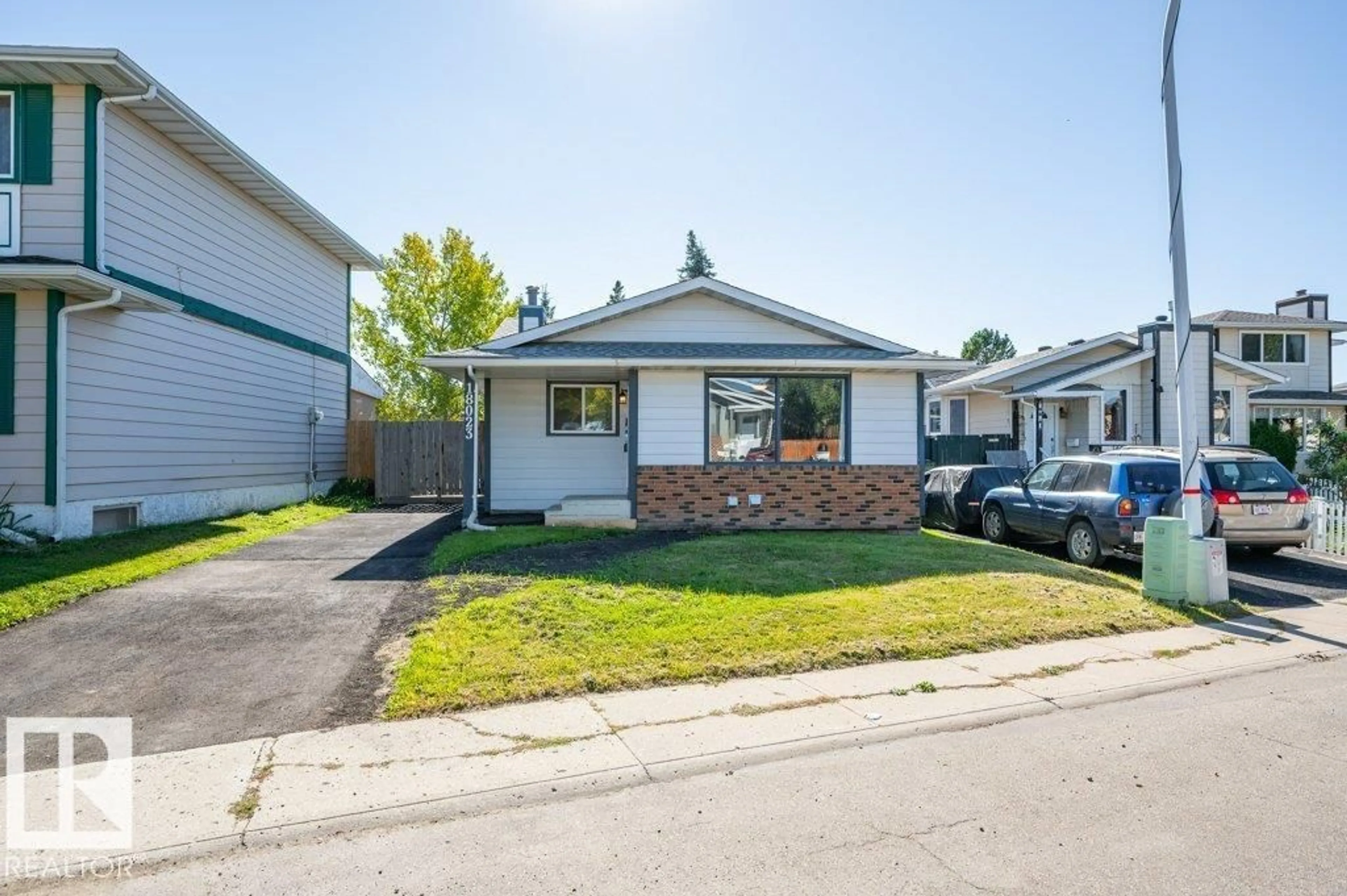 Home with vinyl exterior material, street for 18023 73 AV, Edmonton Alberta T5T3K2