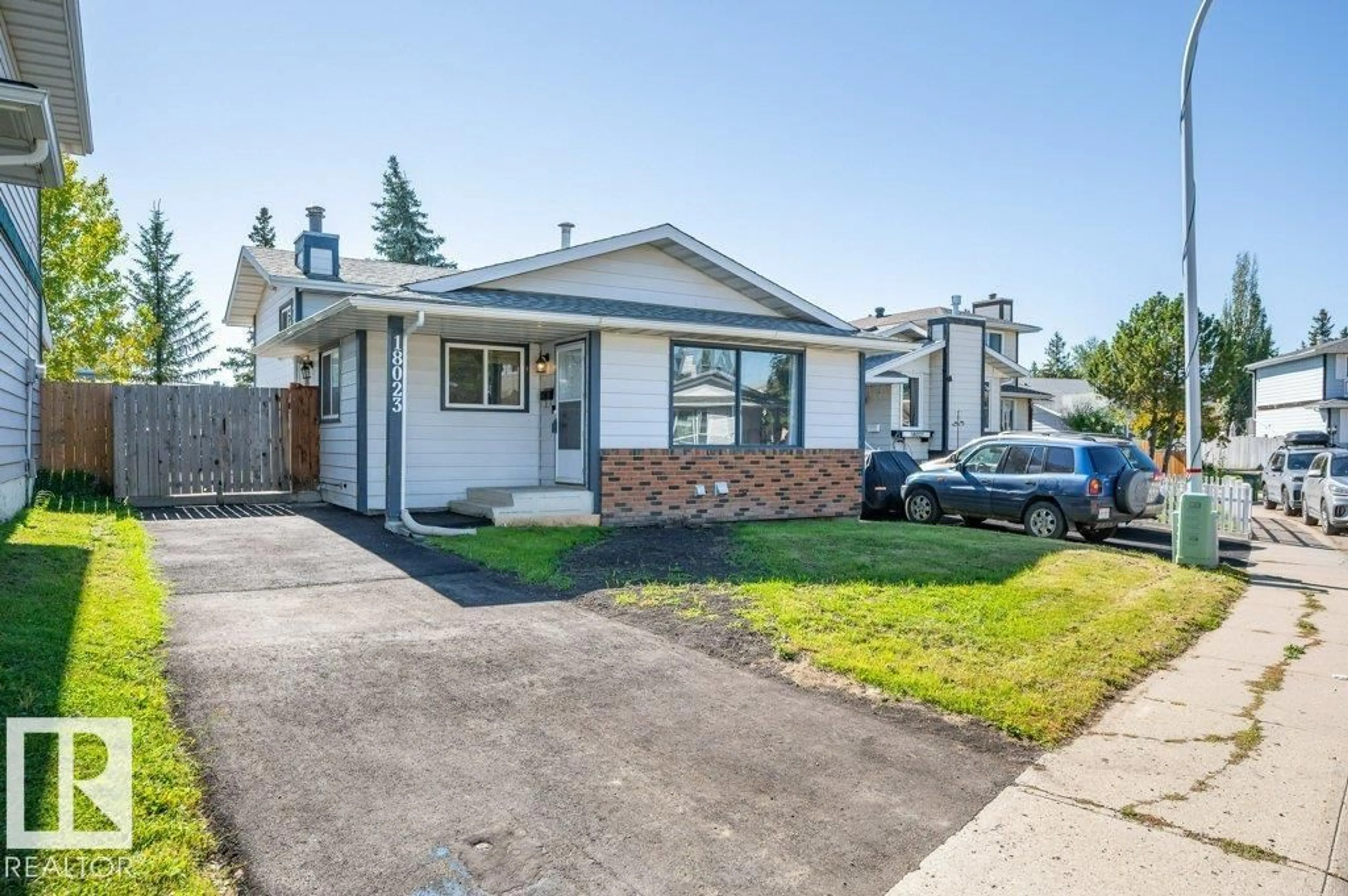 Home with vinyl exterior material, street for 18023 73 AV, Edmonton Alberta T5T3K2