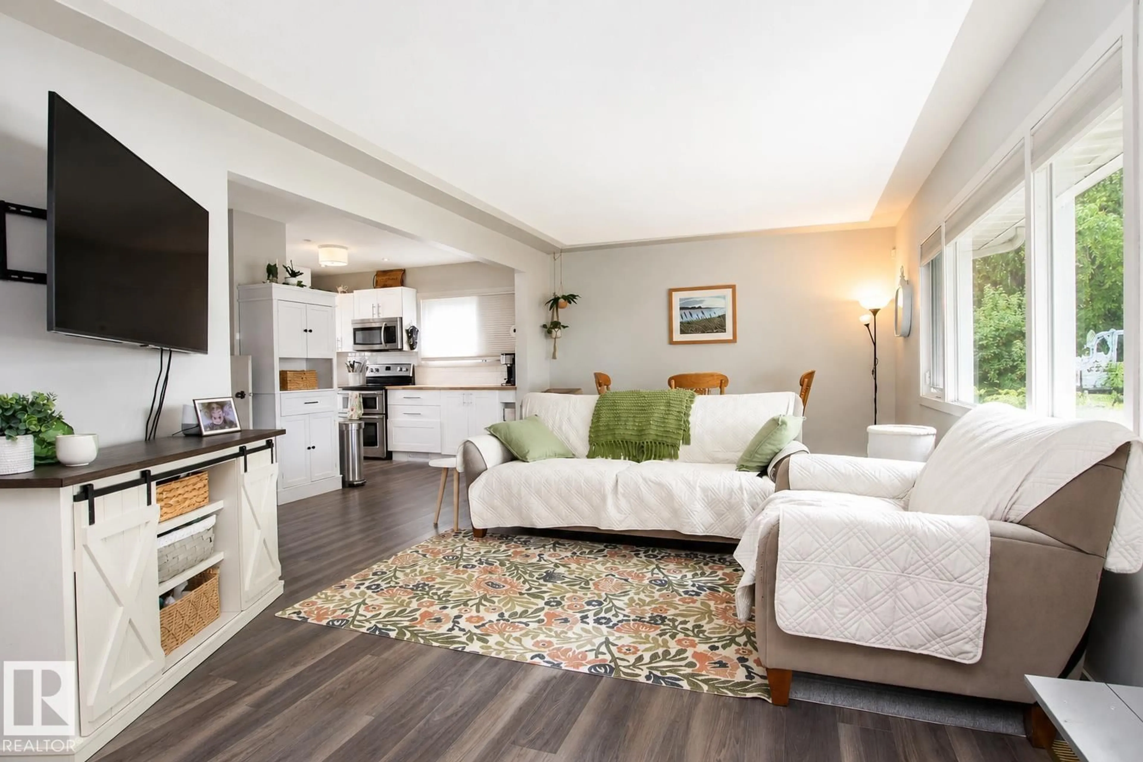 Living room with furniture, unknown for 12231 55 ST, Edmonton Alberta T5W3R5