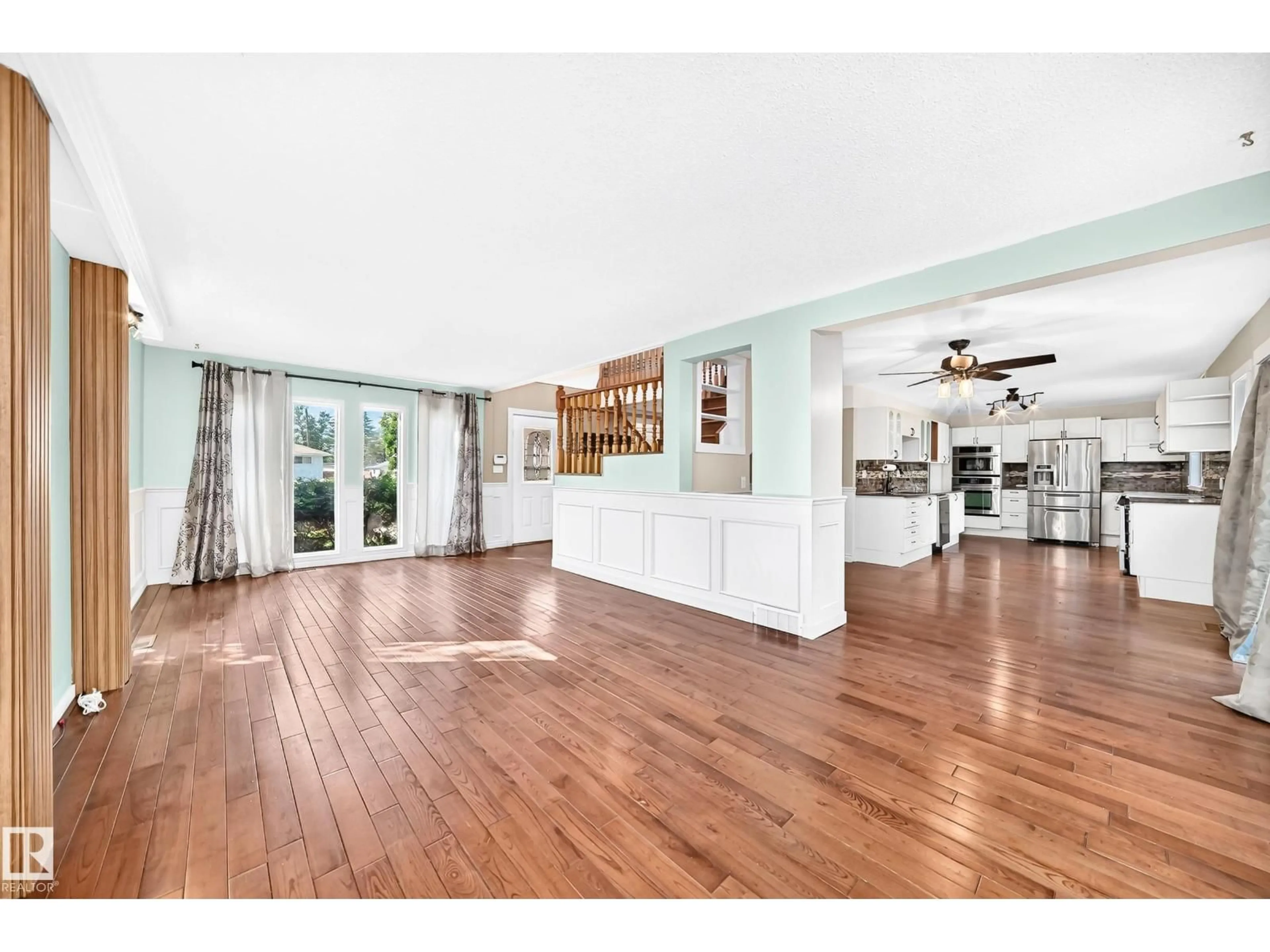 Open concept kitchen, wood/laminate floor for 9703 160 ST, Edmonton Alberta T5P3C9