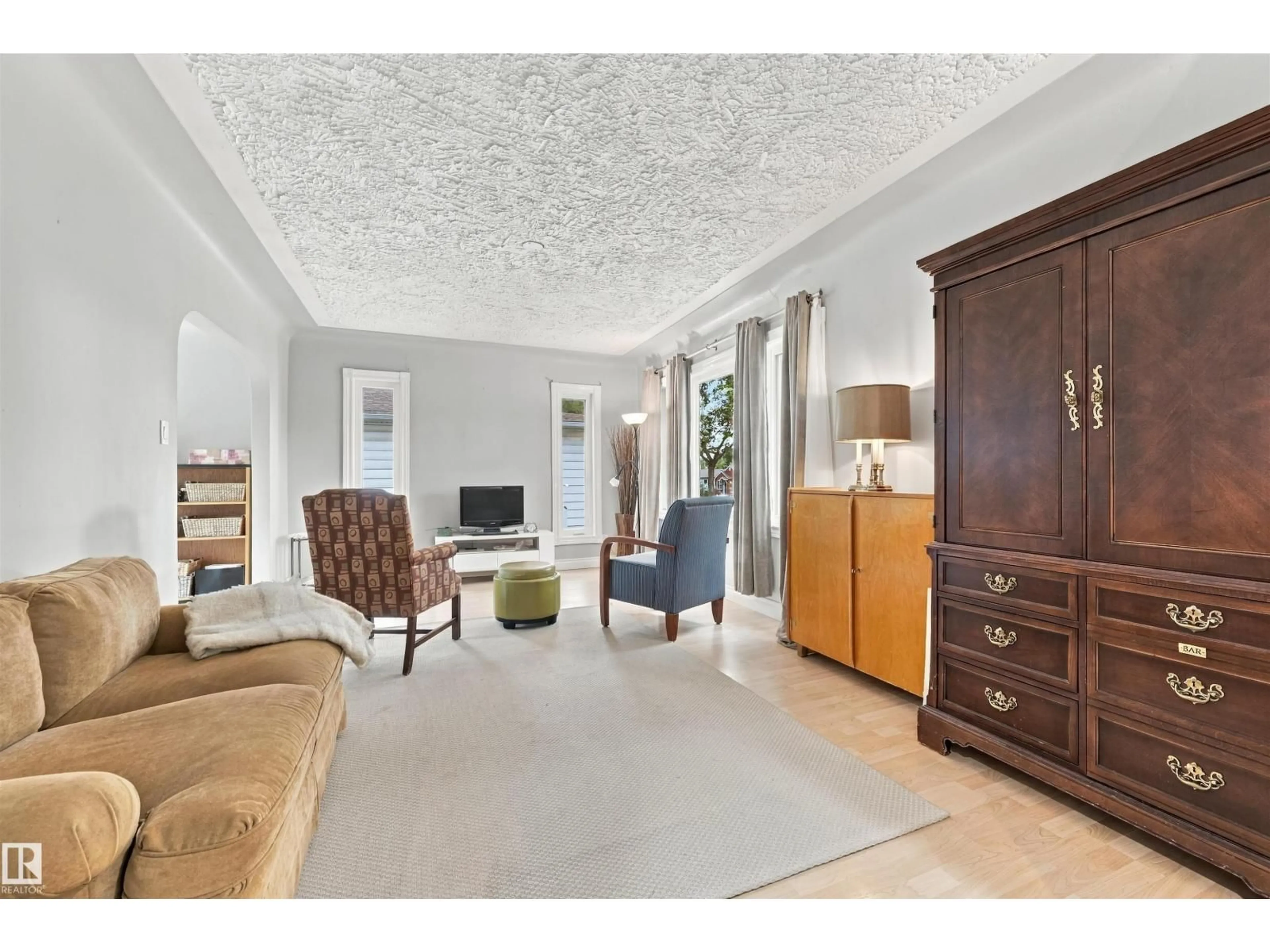 Living room with furniture, unknown for 12111 95 ST, Edmonton Alberta T5G1M9