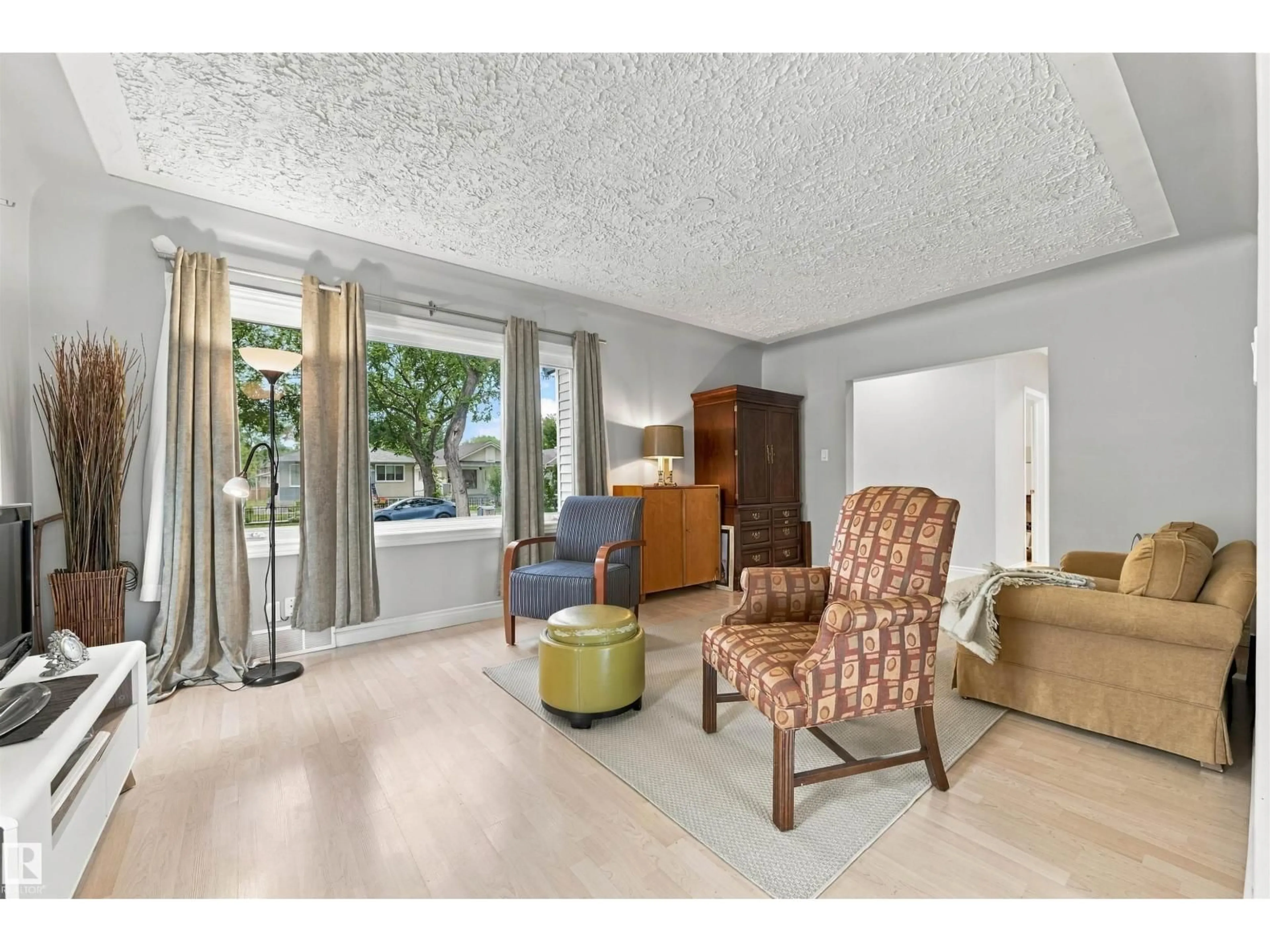 Living room with furniture, unknown for 12111 95 ST, Edmonton Alberta T5G1M9