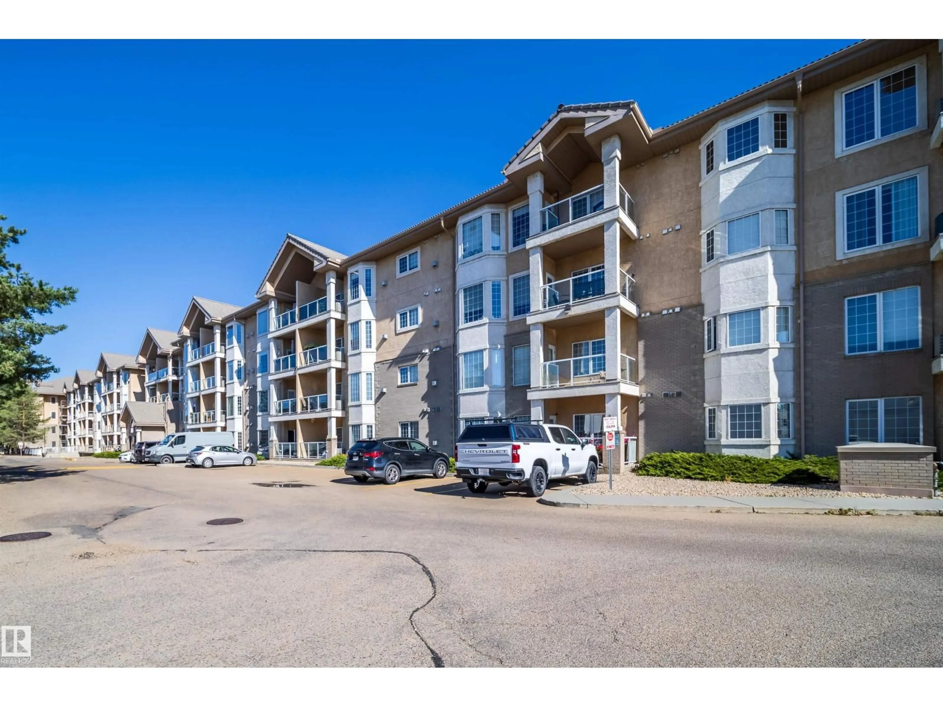 A pic from outside/outdoor area/front of a property/back of a property/a pic from drone, unknown for #208 - 11260 153 AV, Edmonton Alberta T5X6E7