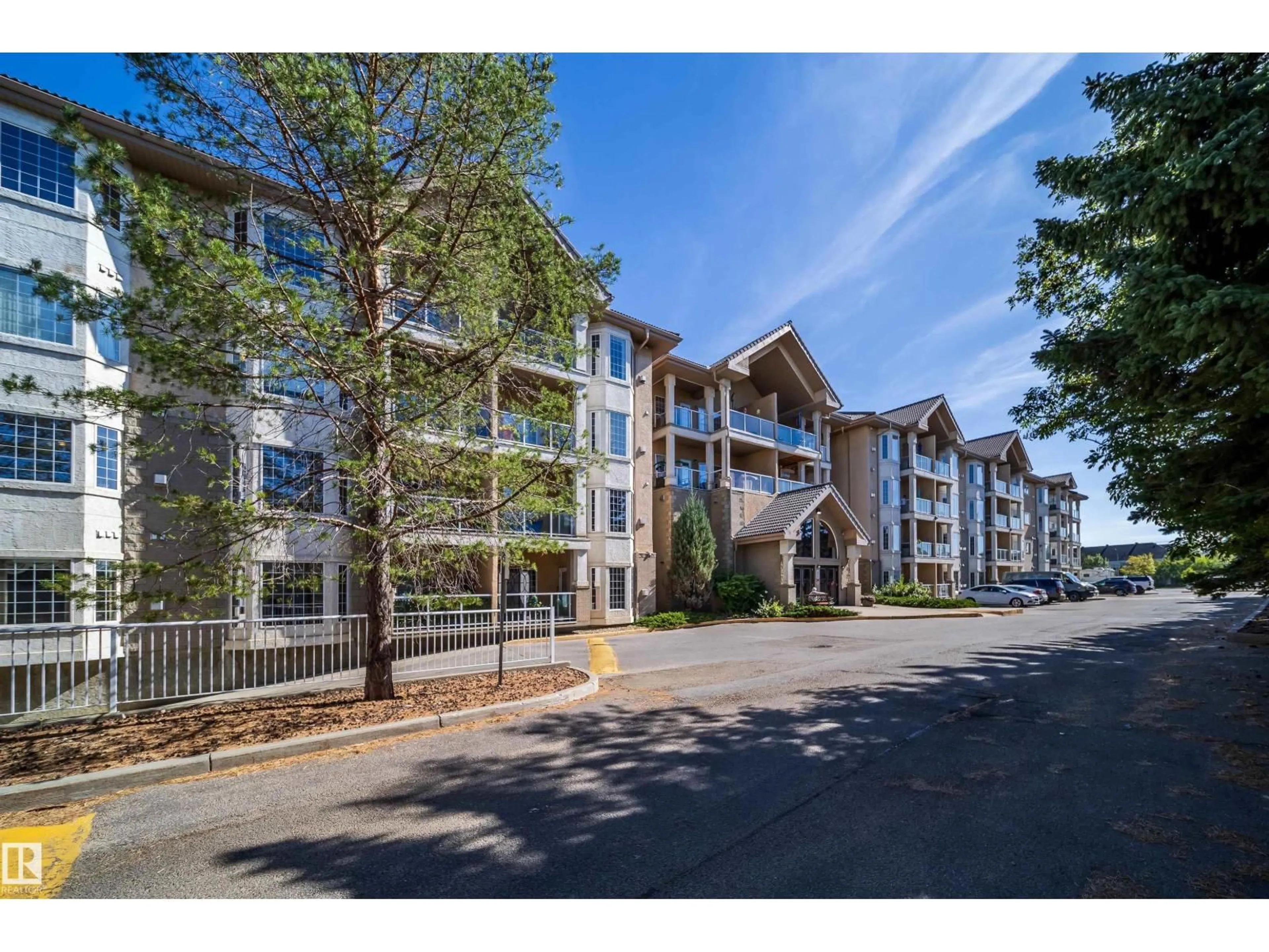 A pic from outside/outdoor area/front of a property/back of a property/a pic from drone, unknown for #208 - 11260 153 AV, Edmonton Alberta T5X6E7