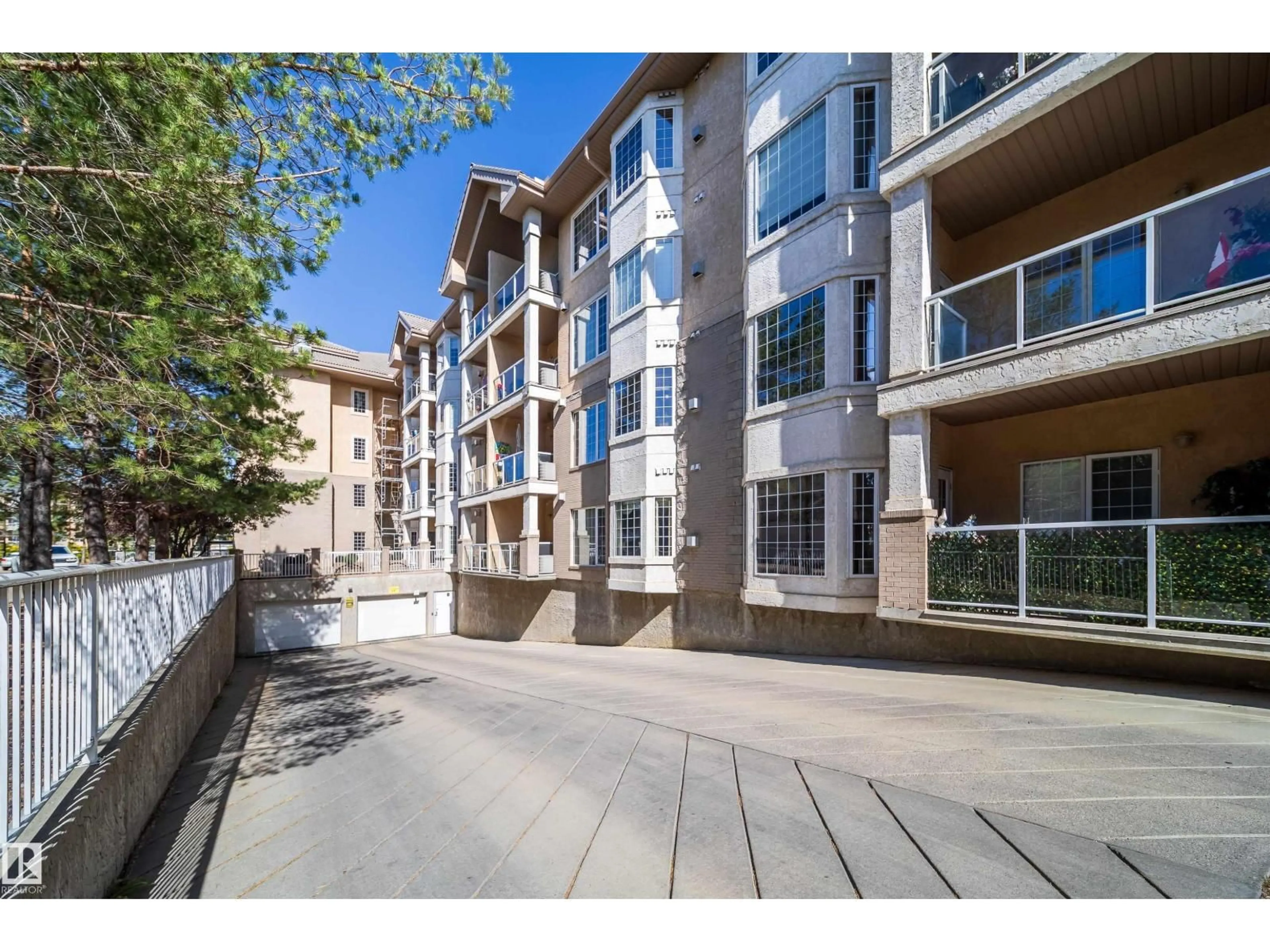 Patio, street for #208 - 11260 153 AV, Edmonton Alberta T5X6E7
