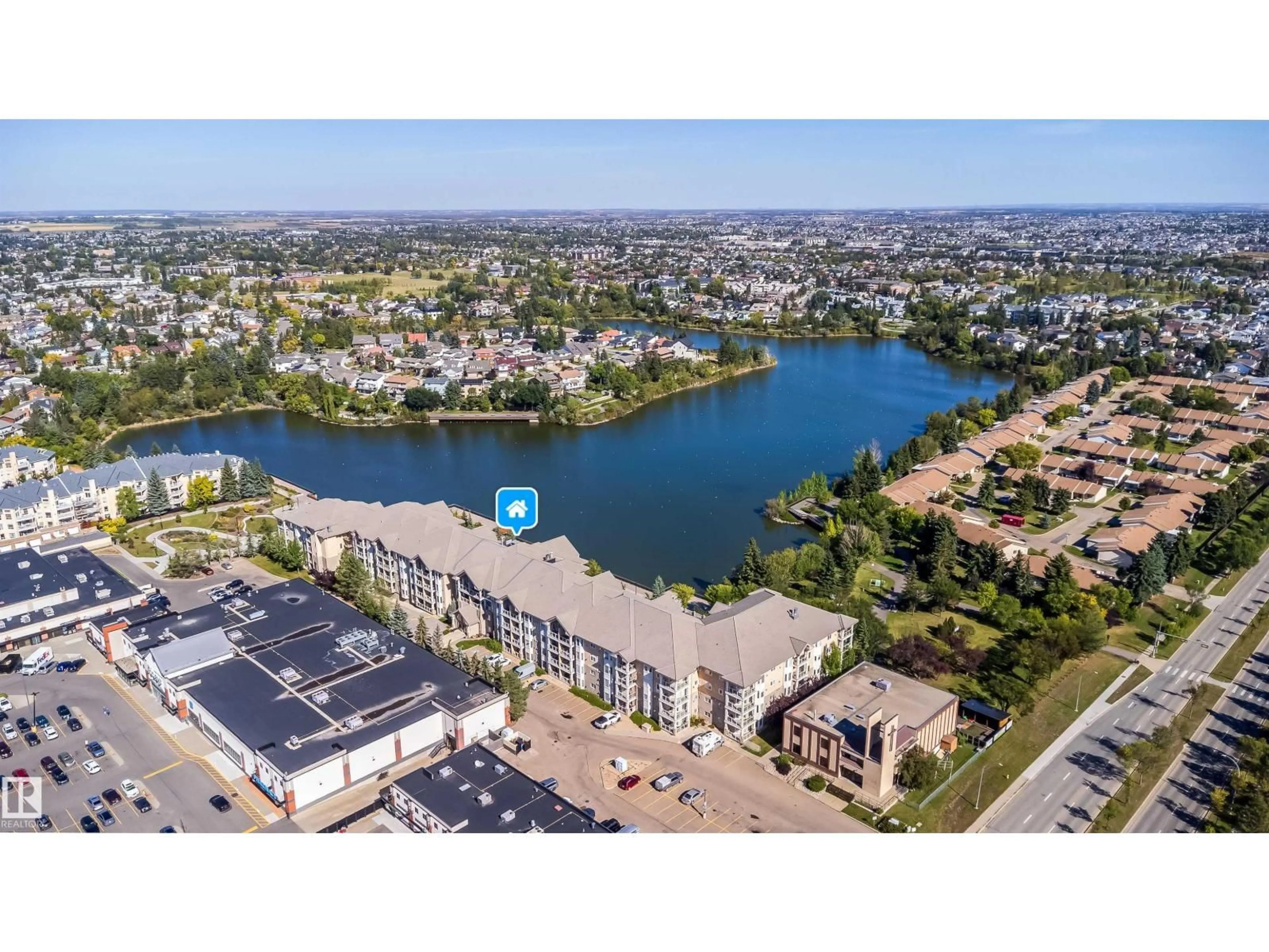 A pic from outside/outdoor area/front of a property/back of a property/a pic from drone, water/lake/river/ocean view for #208 - 11260 153 AV, Edmonton Alberta T5X6E7