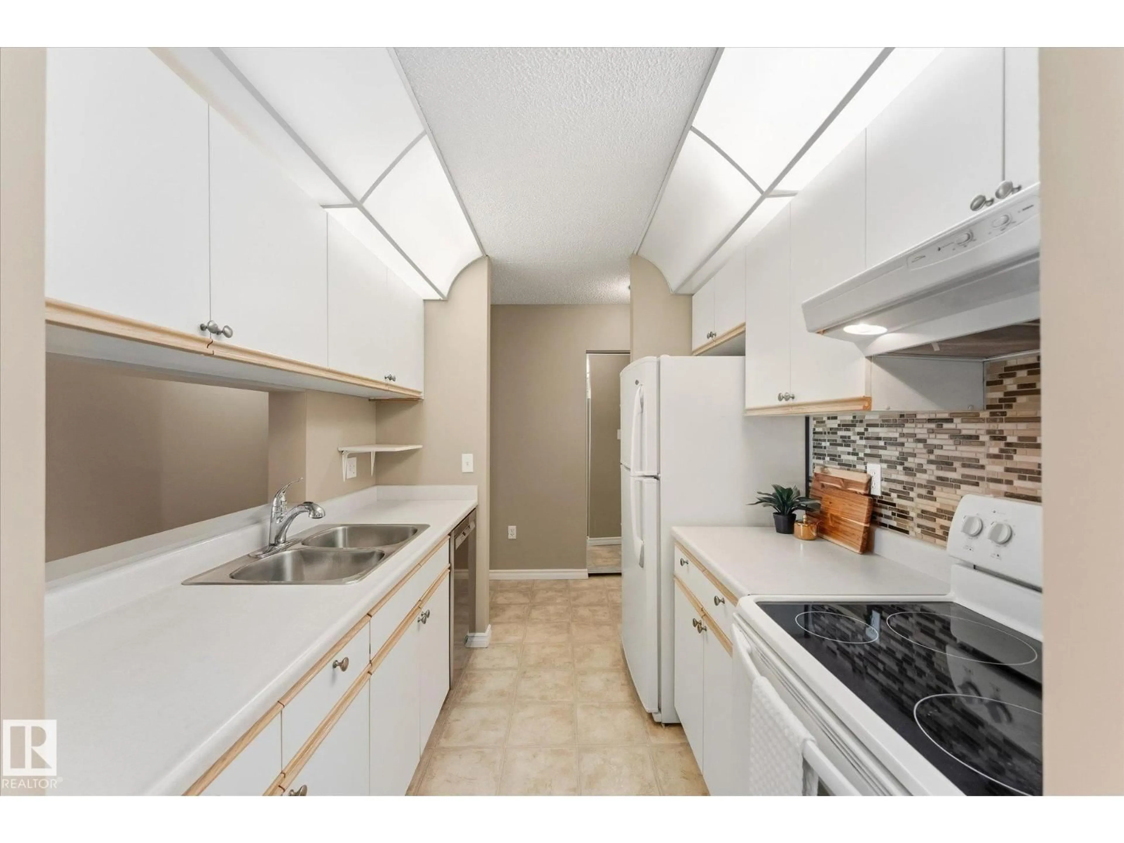 Standard kitchen, ceramic/tile floor for #104 - 2508 50 ST, Edmonton Alberta T6L6X9