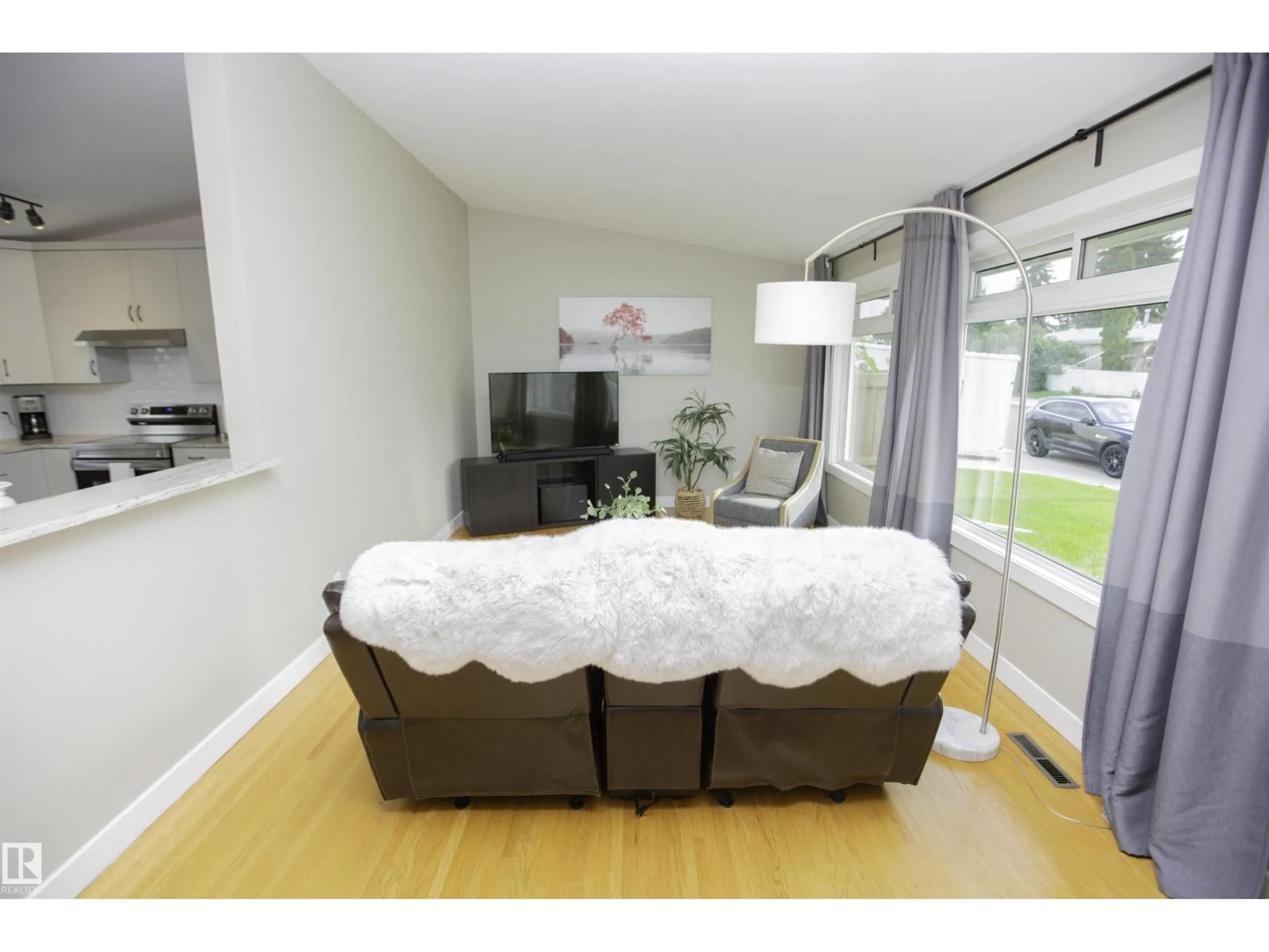 Living room with furniture, unknown for NW - 9107 58 ST, Edmonton Alberta T6B1L3