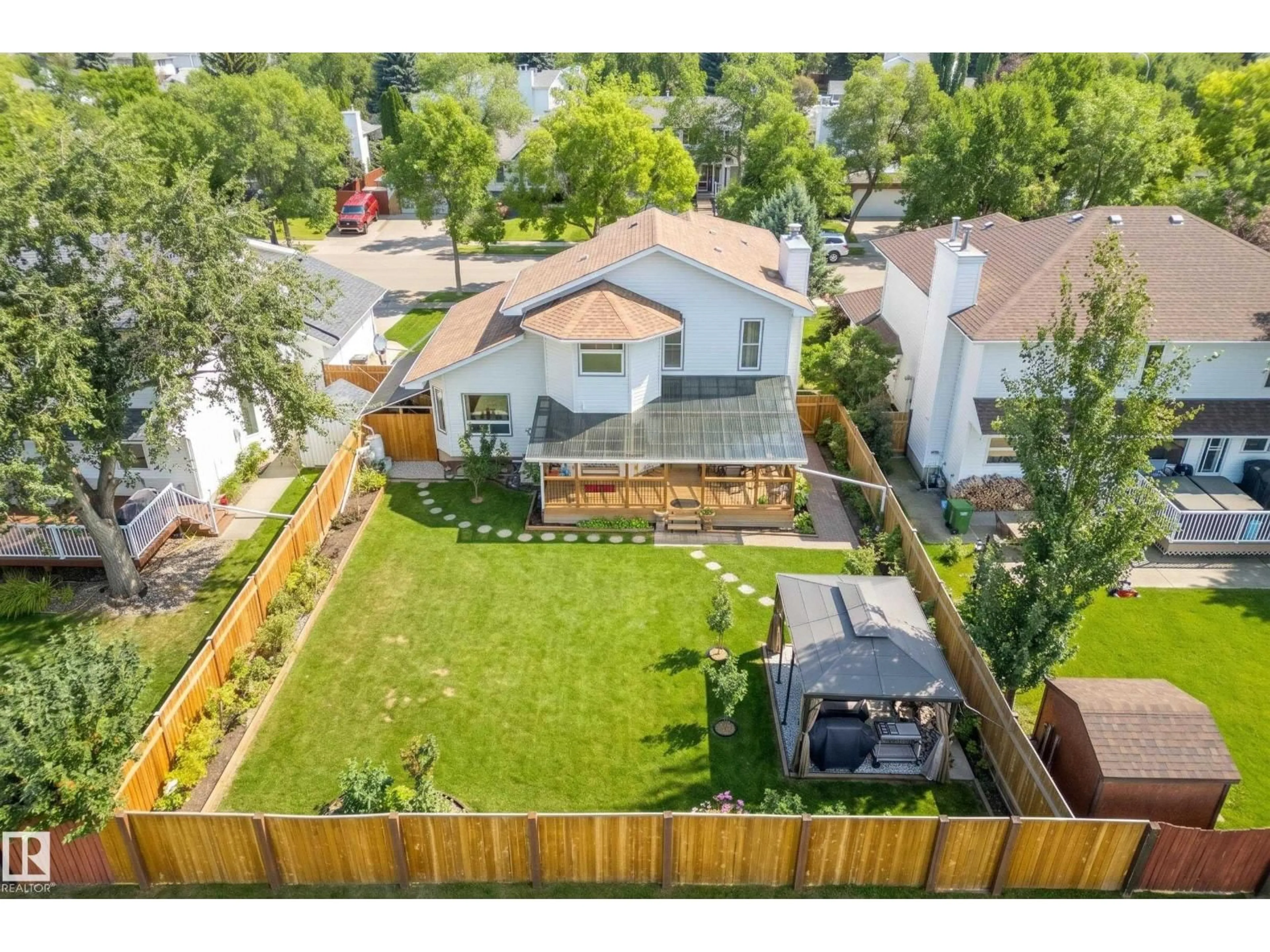 A pic from outside/outdoor area/front of a property/back of a property/a pic from drone, street for 38 DEANE CR, St. Albert Alberta T8N4Z4