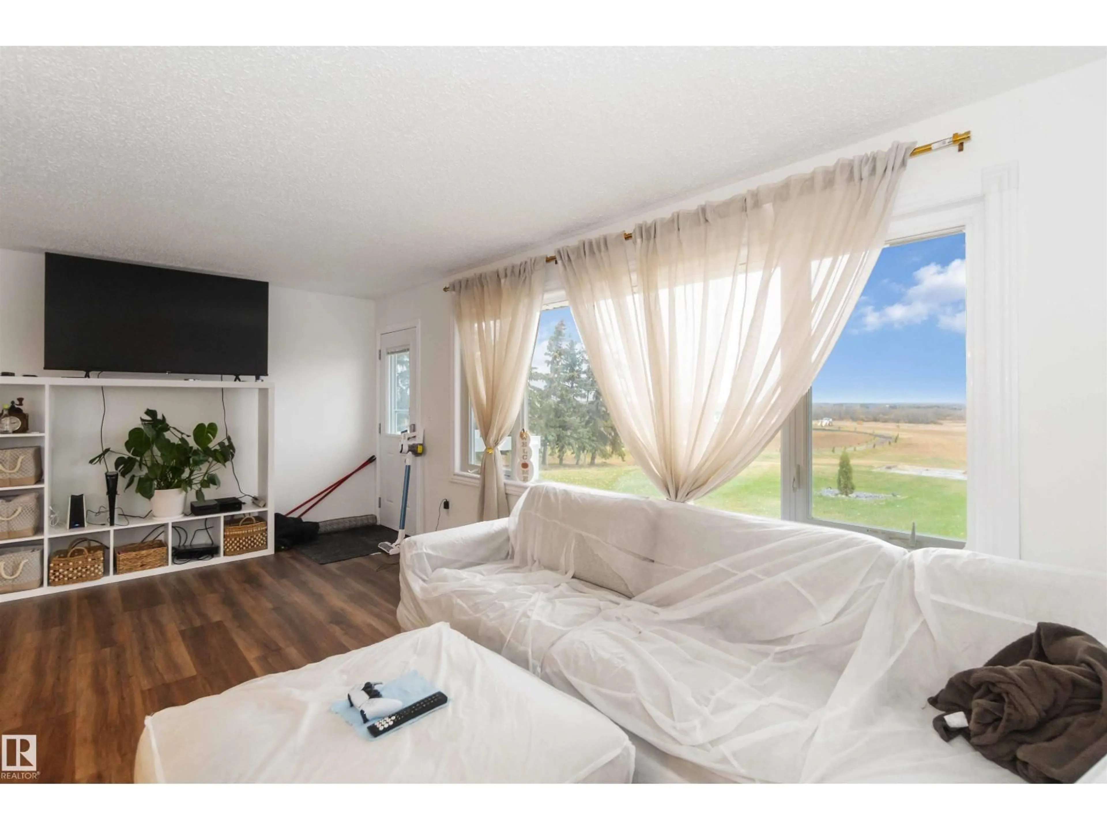 Living room with furniture, unknown for 53273 RGE ROAD 215, Rural Strathcona County Alberta T8E2B4