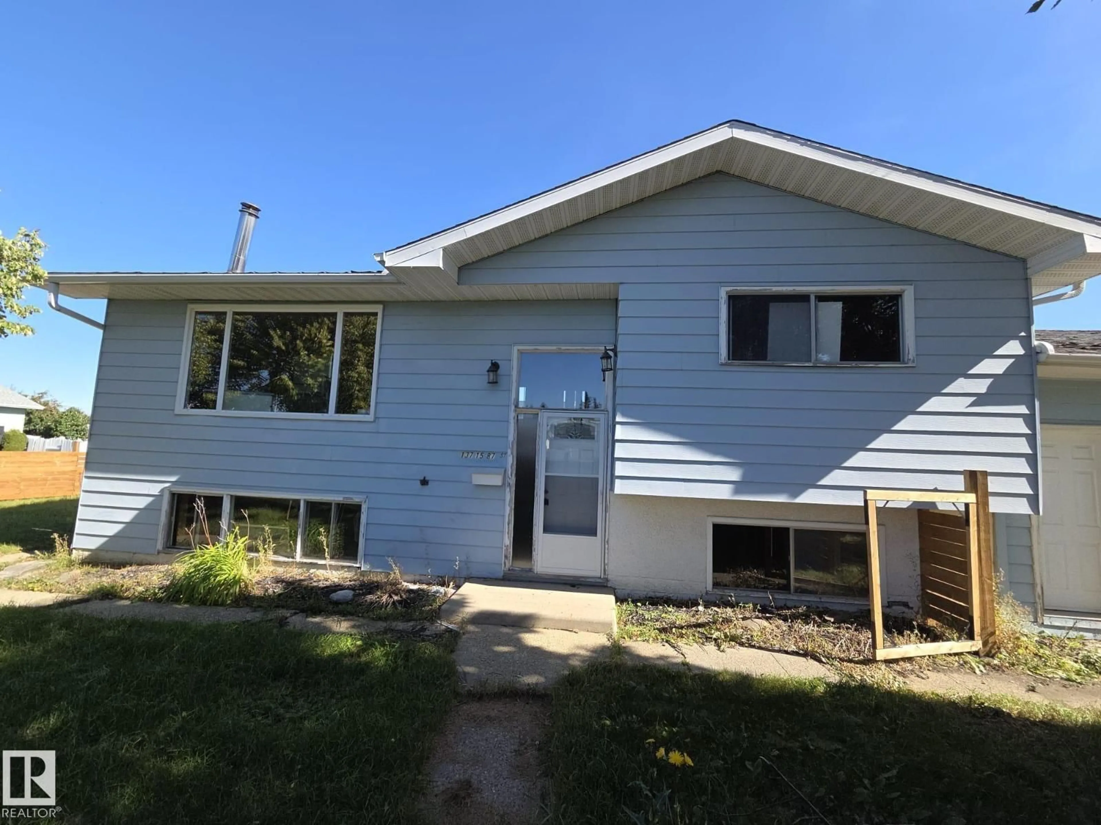 Home with vinyl exterior material, street for NW - 13715 87 ST, Edmonton Alberta T5E3G1