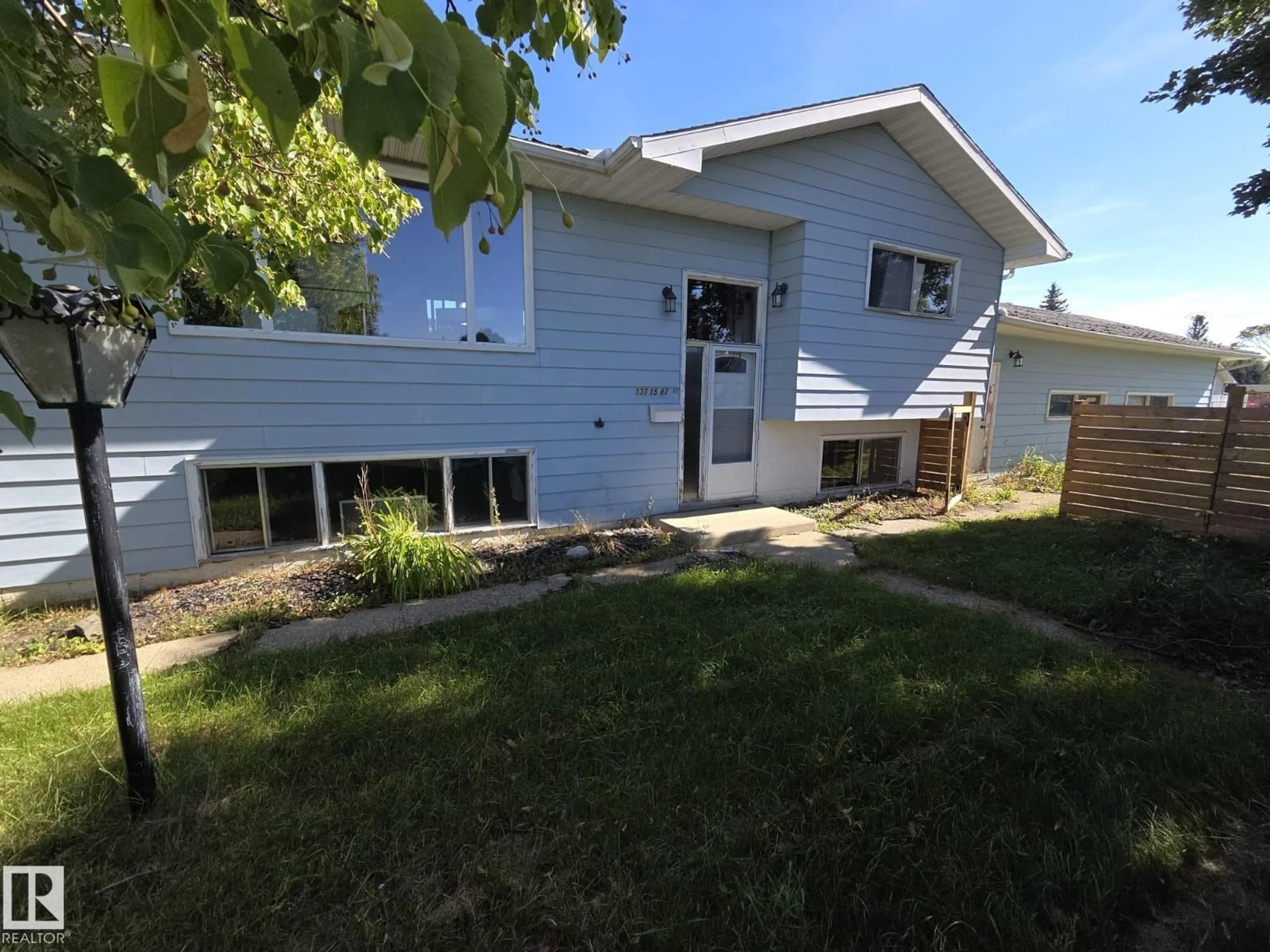 Home with vinyl exterior material, street for NW - 13715 87 ST, Edmonton Alberta T5E3G1