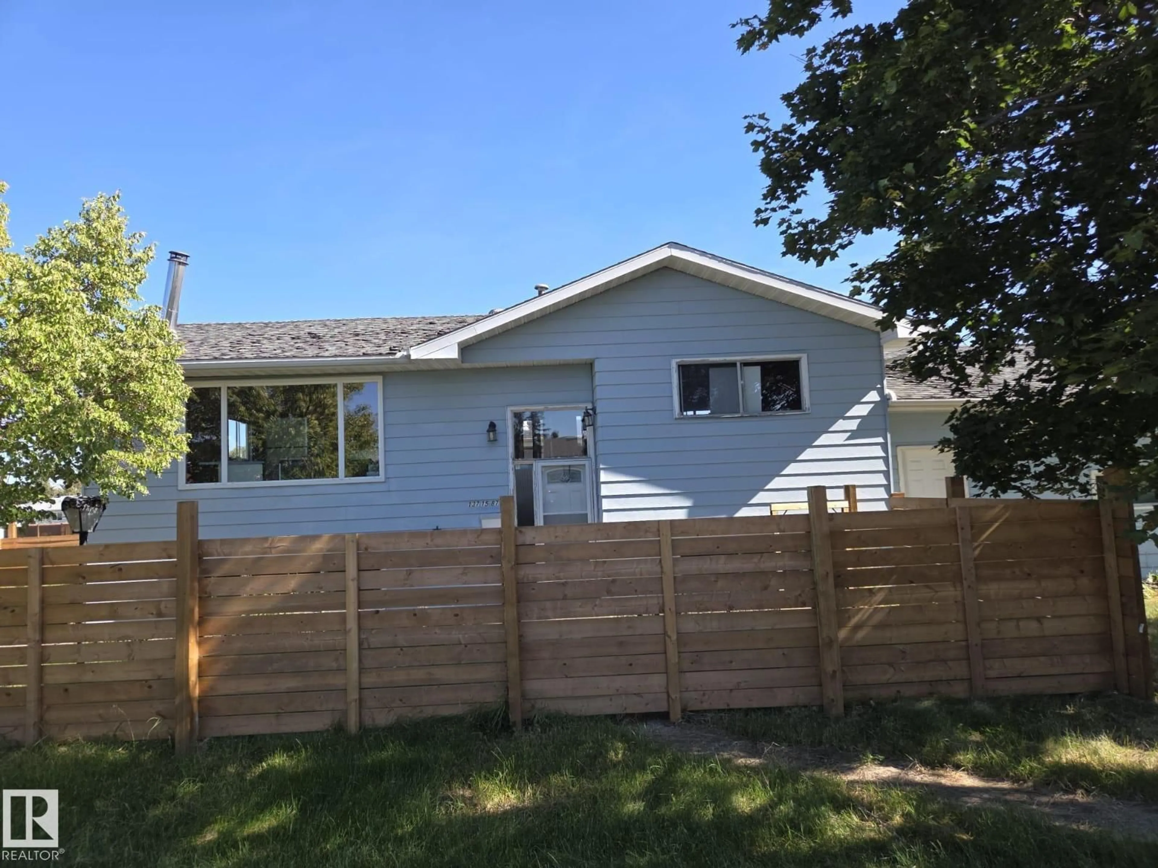 Home with vinyl exterior material, street for NW - 13715 87 ST, Edmonton Alberta T5E3G1
