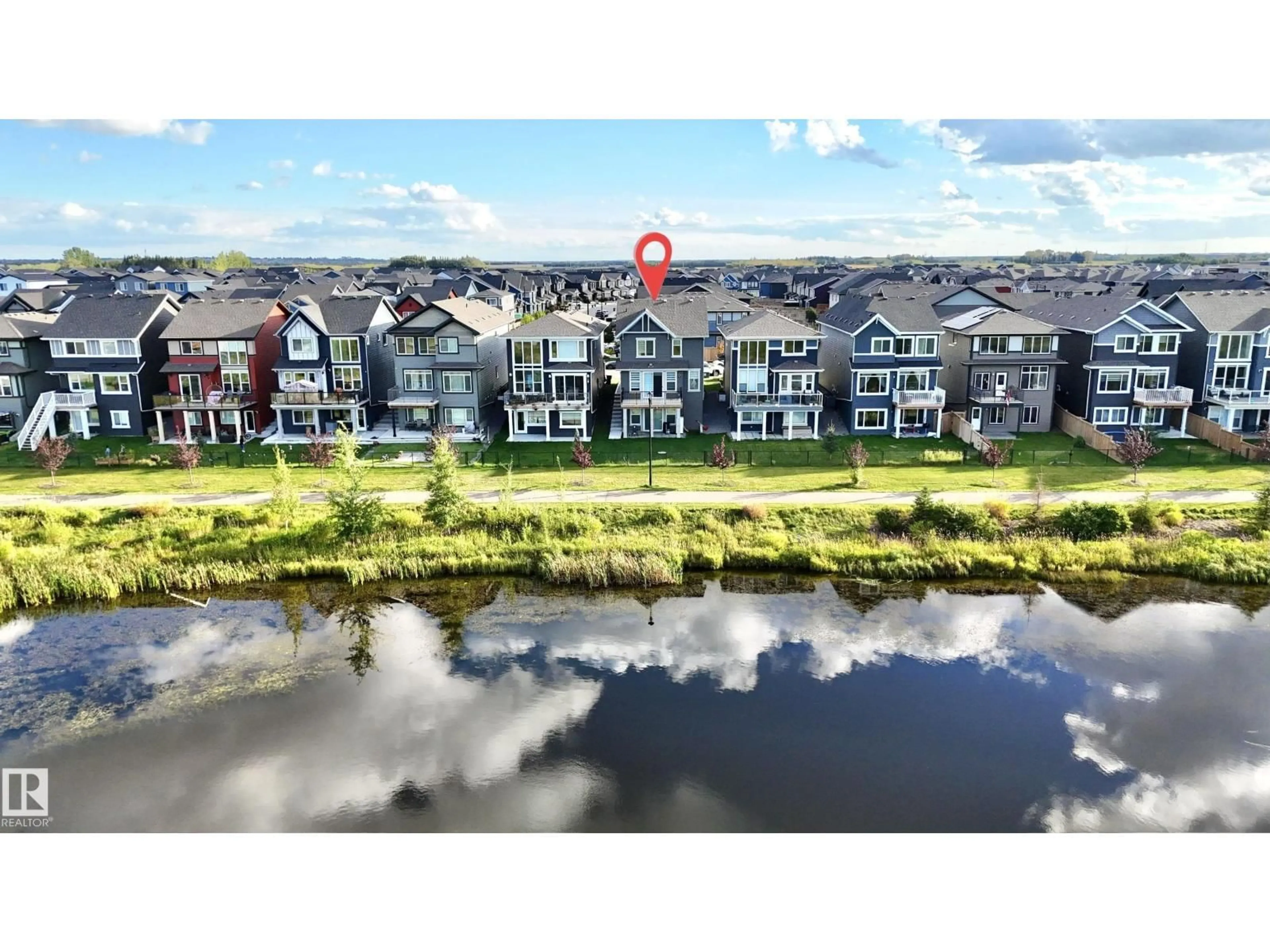 A pic from outside/outdoor area/front of a property/back of a property/a pic from drone, water/lake/river/ocean view for CI SW - 1583 PLUM CIRCLE, Edmonton Alberta T6X2W9