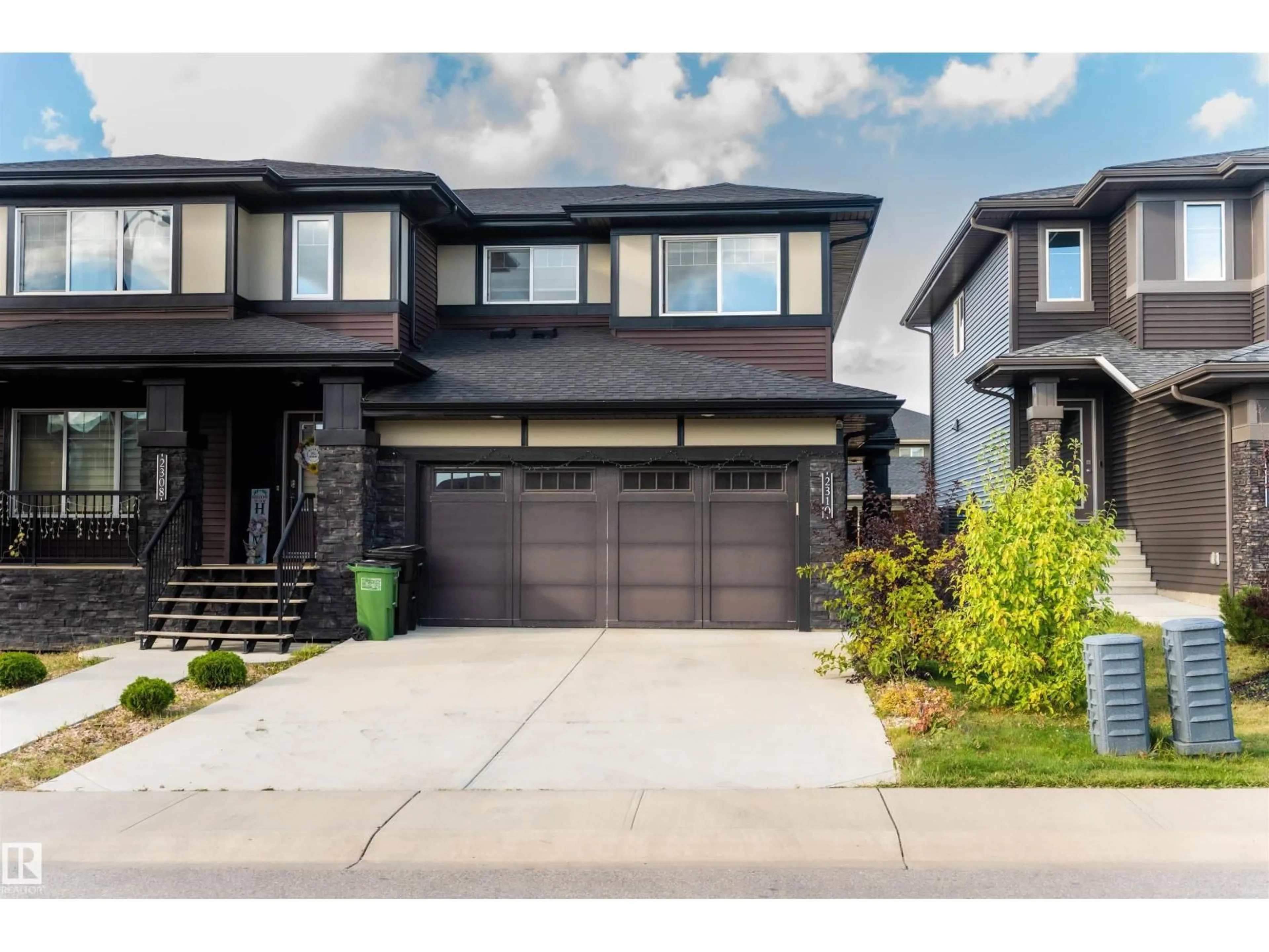 Home with brick exterior material, street for 2310 WONNACOTT CR, Edmonton Alberta T6X2J4