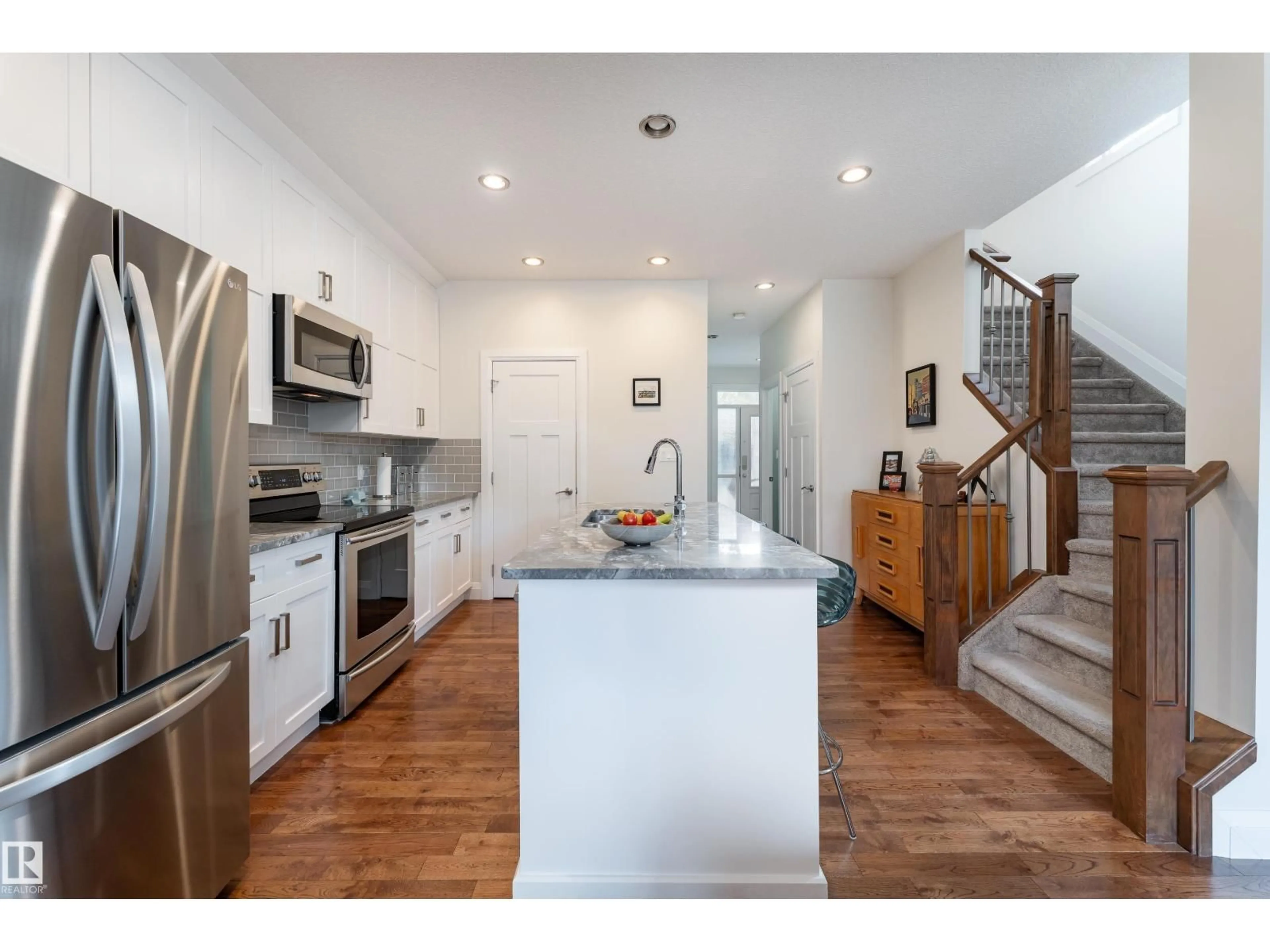 Open concept kitchen, unknown for 8340 79 AV, Edmonton Alberta T6C0R3