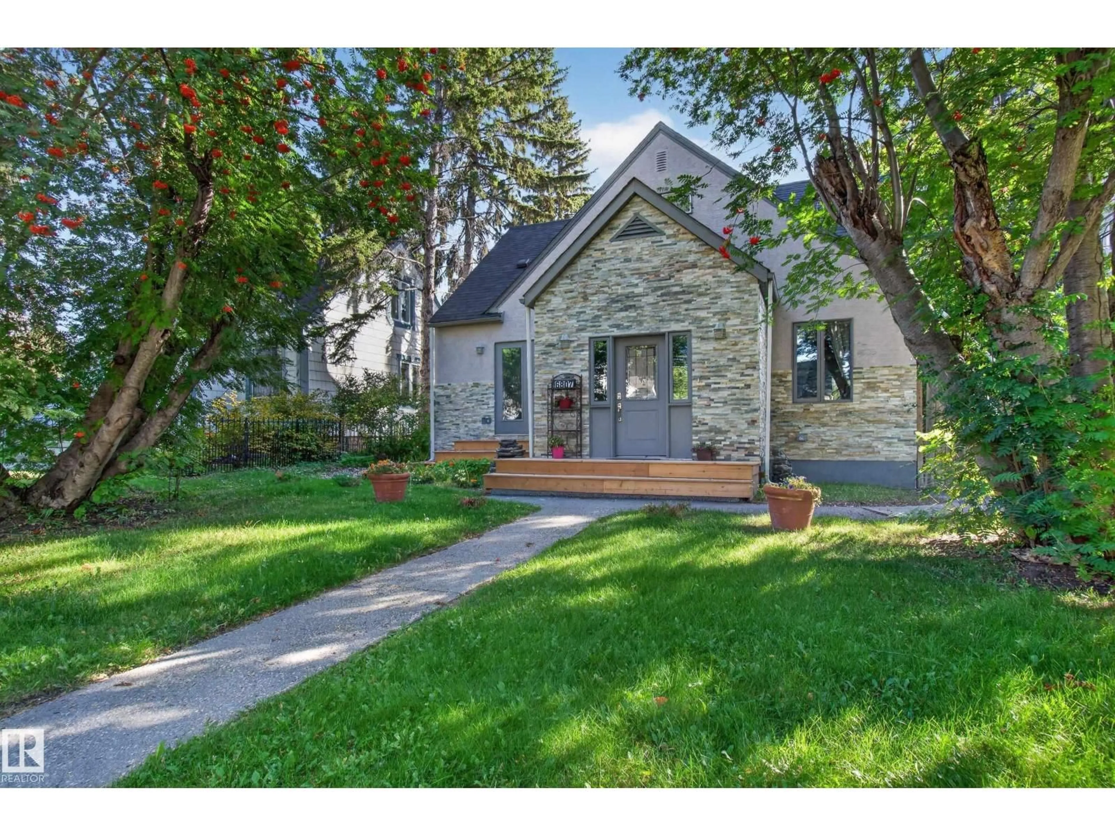 Home with brick exterior material, street for NW - 6807 112A ST, Edmonton Alberta T6H3K5