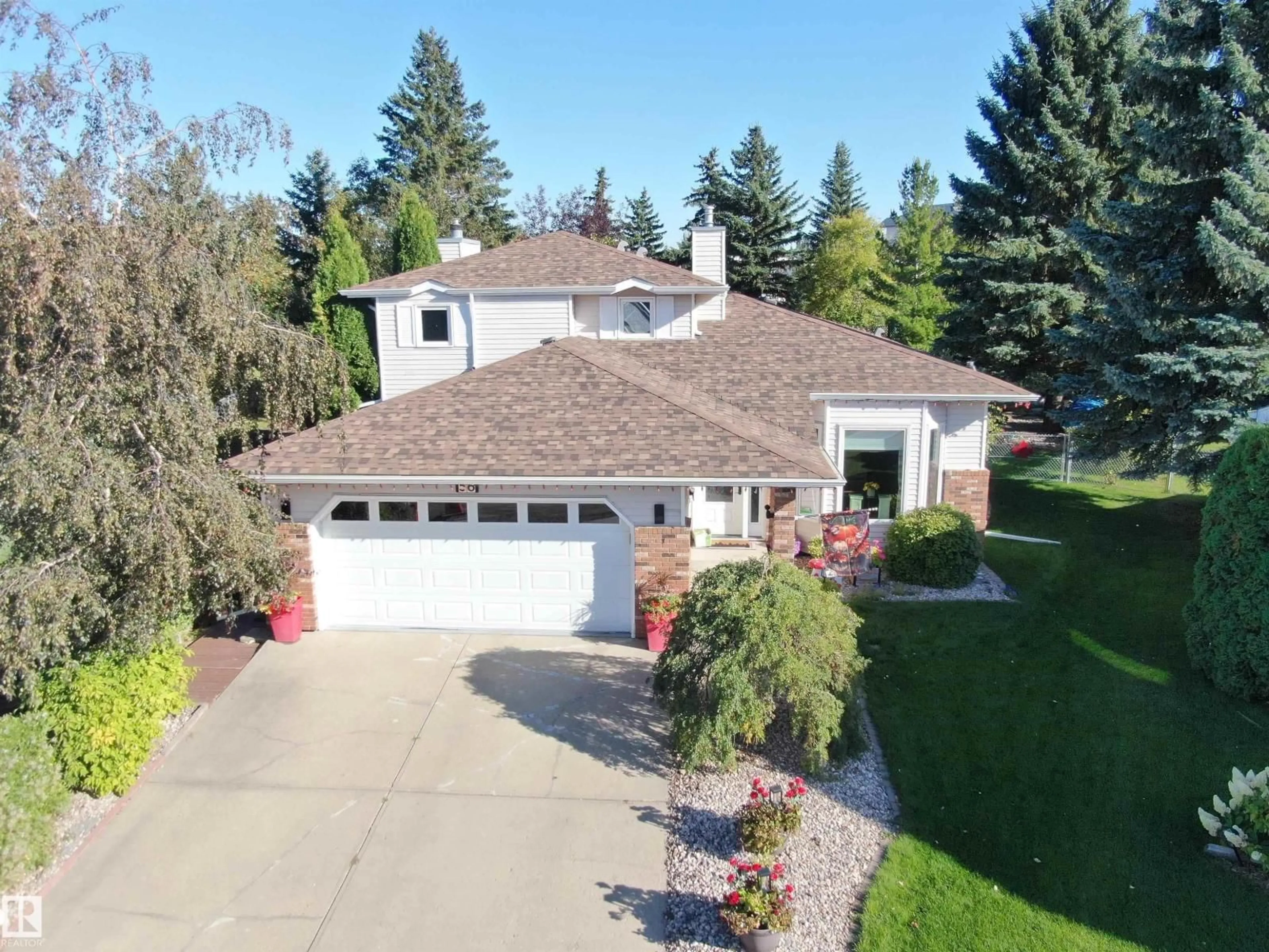 A pic from outside/outdoor area/front of a property/back of a property/a pic from drone, street for 56 STONESHIRE CR, Spruce Grove Alberta T7X3E2