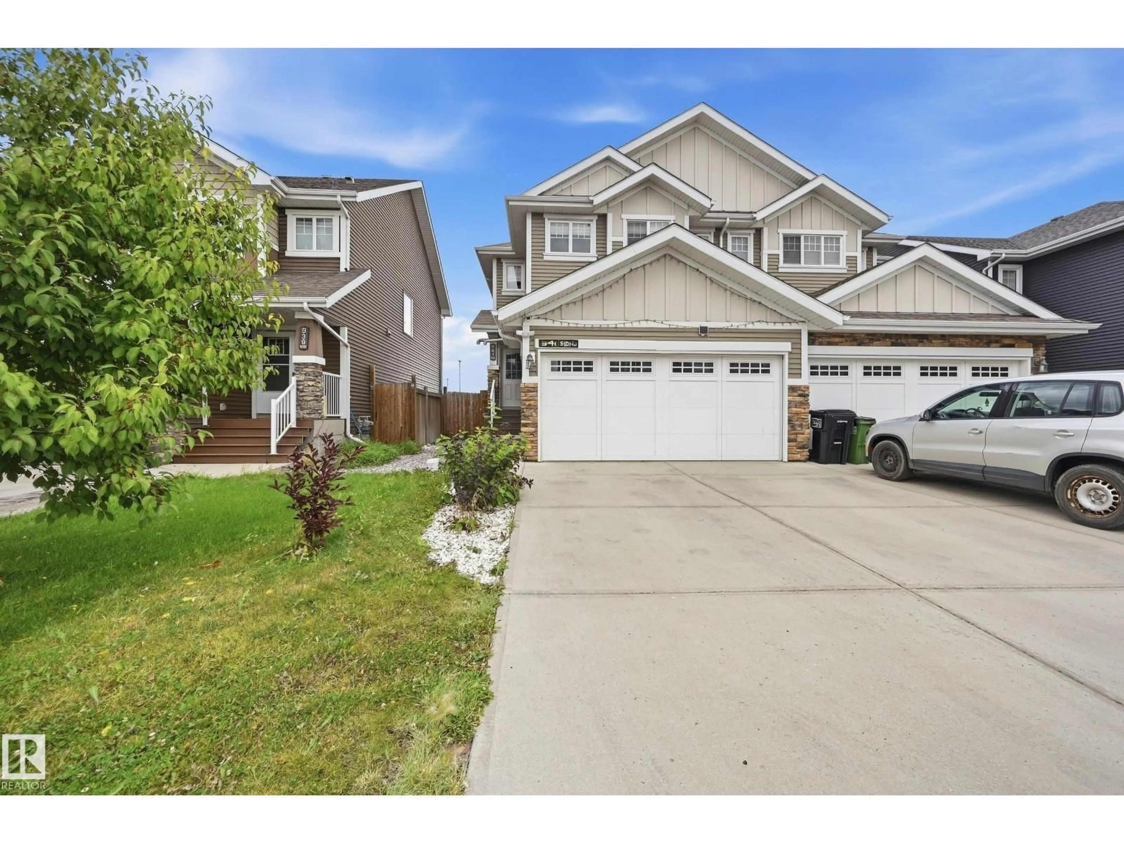 Home with vinyl exterior material, street for 941 EBBERS CR, Edmonton Alberta T5Y3T9