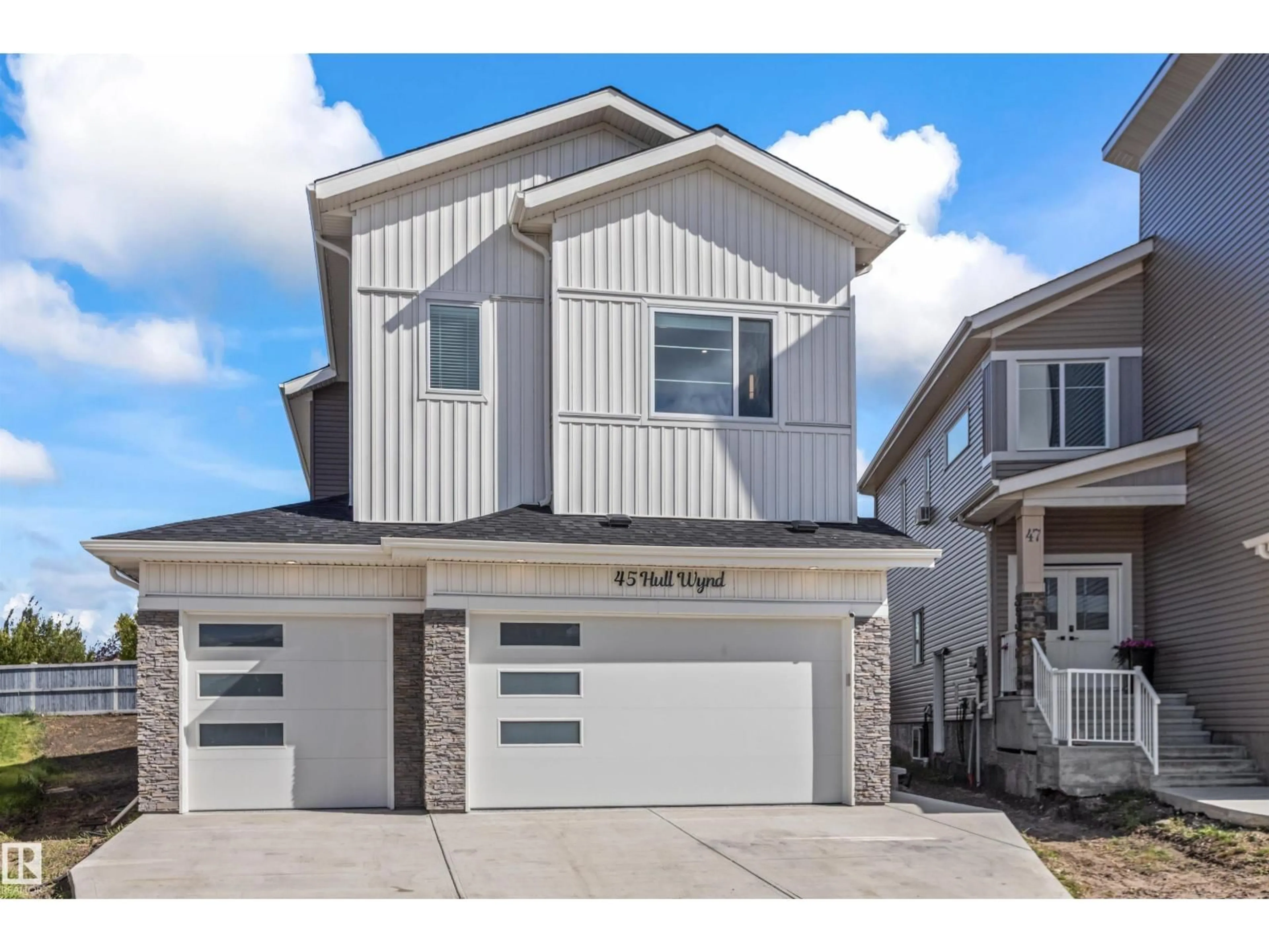 Home with vinyl exterior material, street for 45 HULL WD, Spruce Grove Alberta T7X0X5