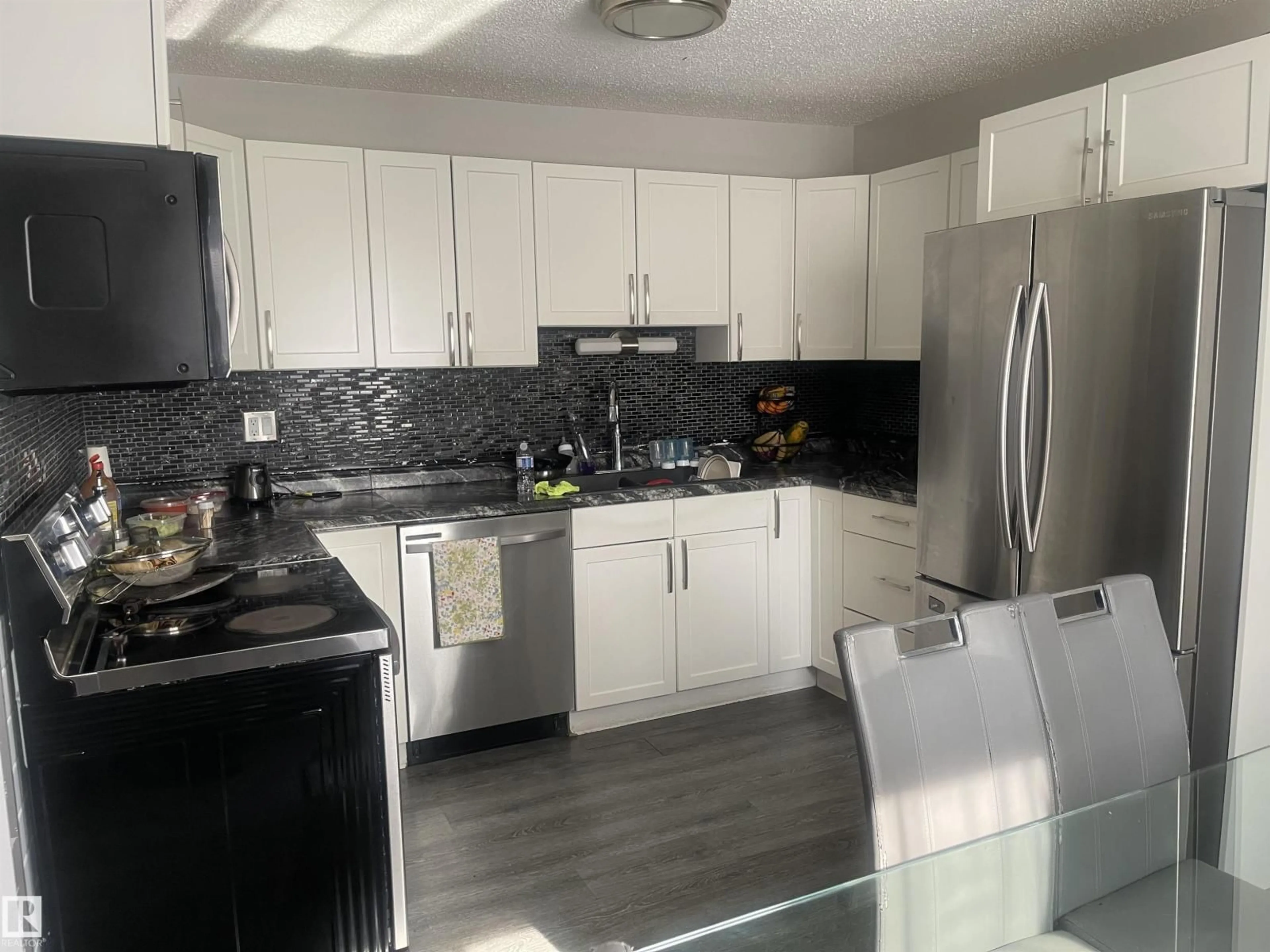Open concept kitchen, unknown for NW - 3221 132A AV, Edmonton Alberta T5A3K4