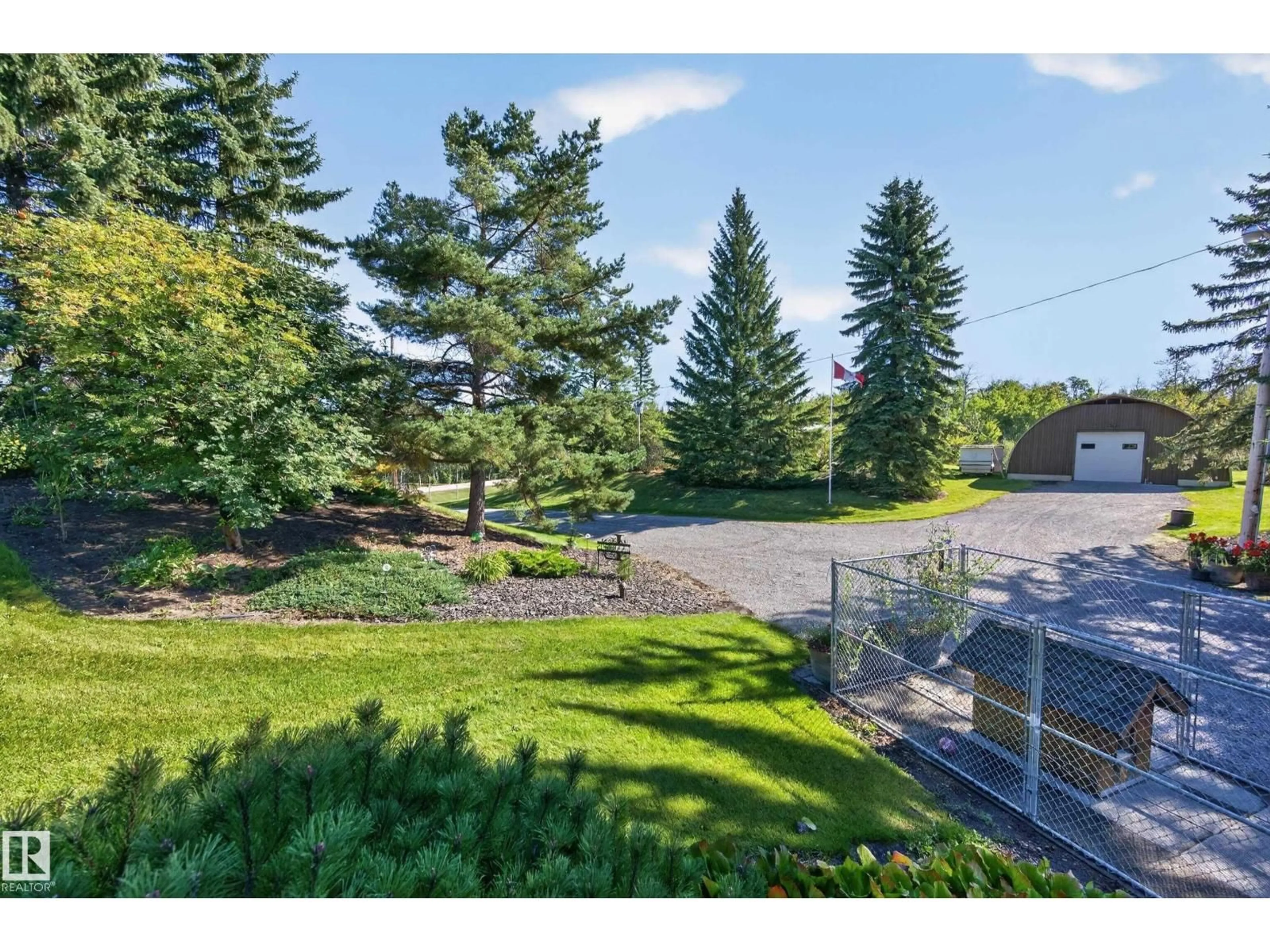 A pic from outside/outdoor area/front of a property/back of a property/a pic from drone, unknown for 53127 - 49 RANGE ROAD 211, Rural Strathcona County Alberta T8G2C5