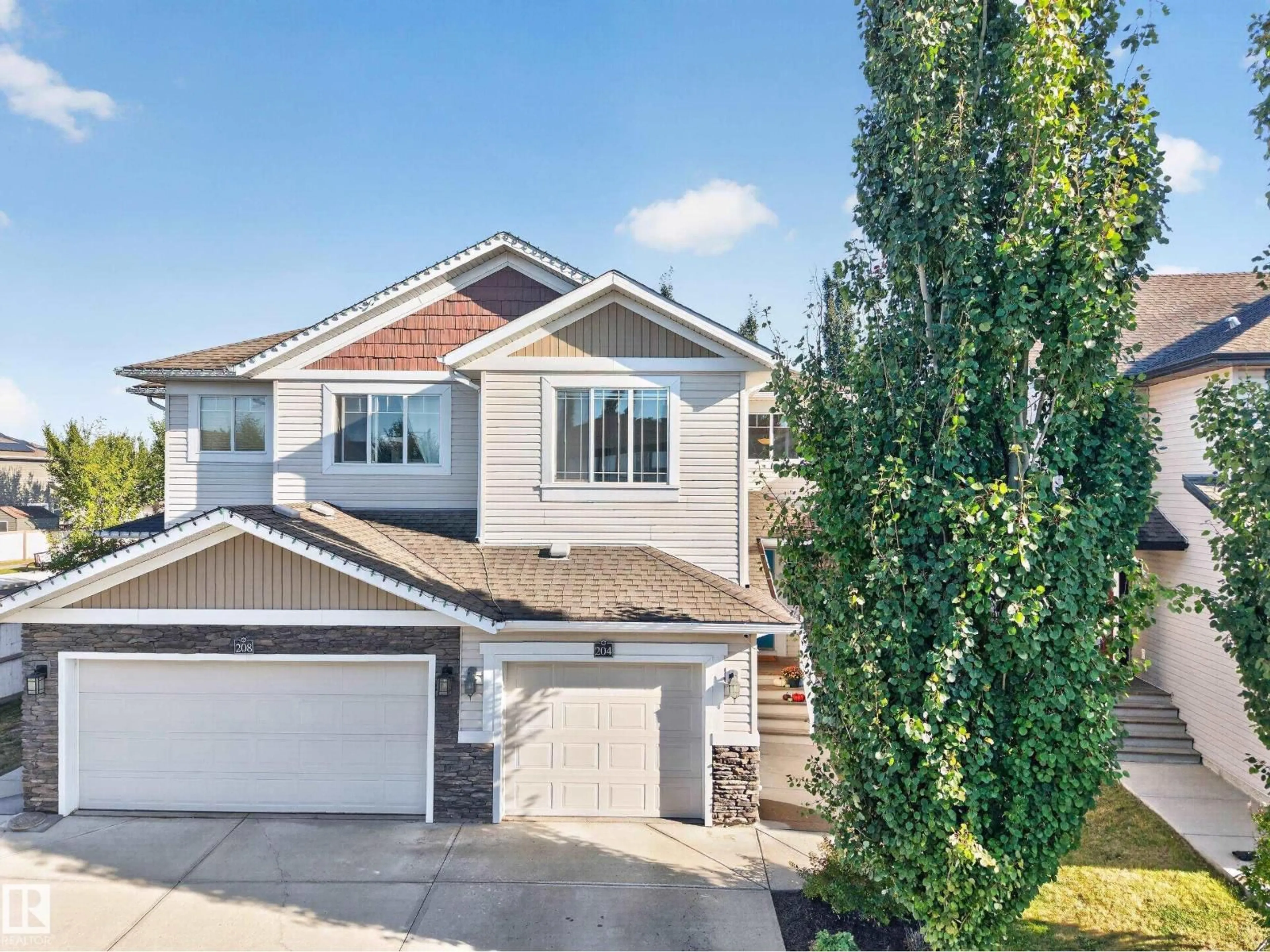 A pic from outside/outdoor area/front of a property/back of a property/a pic from drone, street for 204 SUMMERSTONE LN, Sherwood Park Alberta T8H0K2