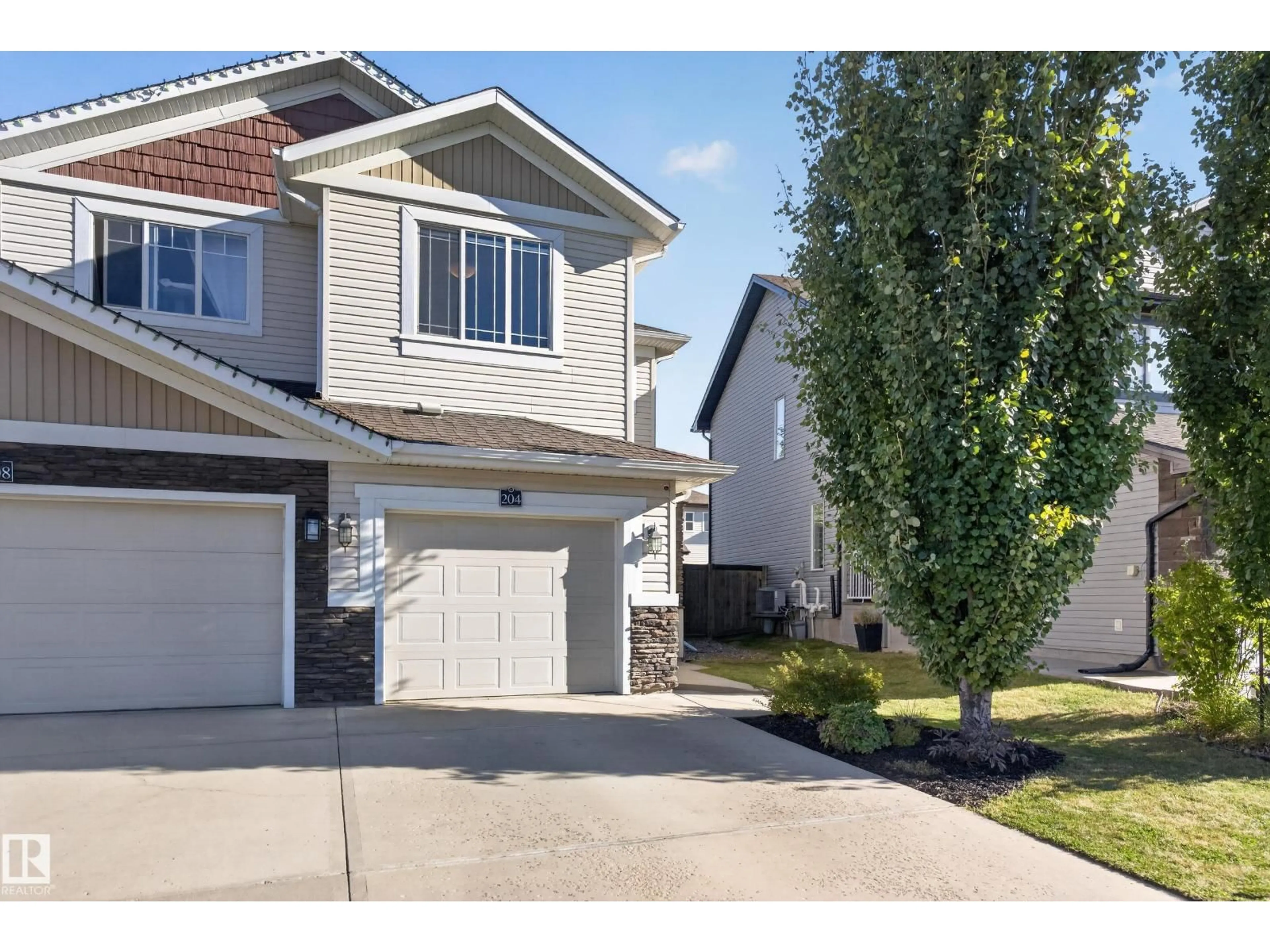 Home with vinyl exterior material, street for 204 SUMMERSTONE LN, Sherwood Park Alberta T8H0K2