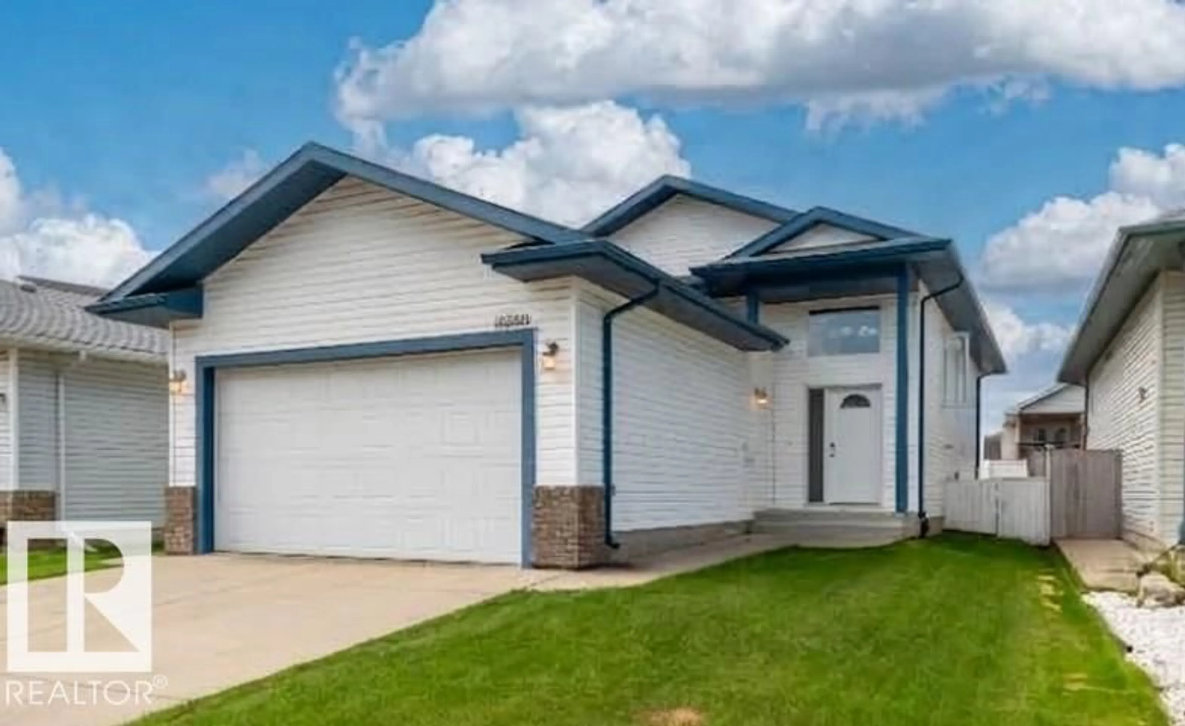 Home with vinyl exterior material, street for NW - 16280 51 ST, Edmonton Alberta T5Y3C8