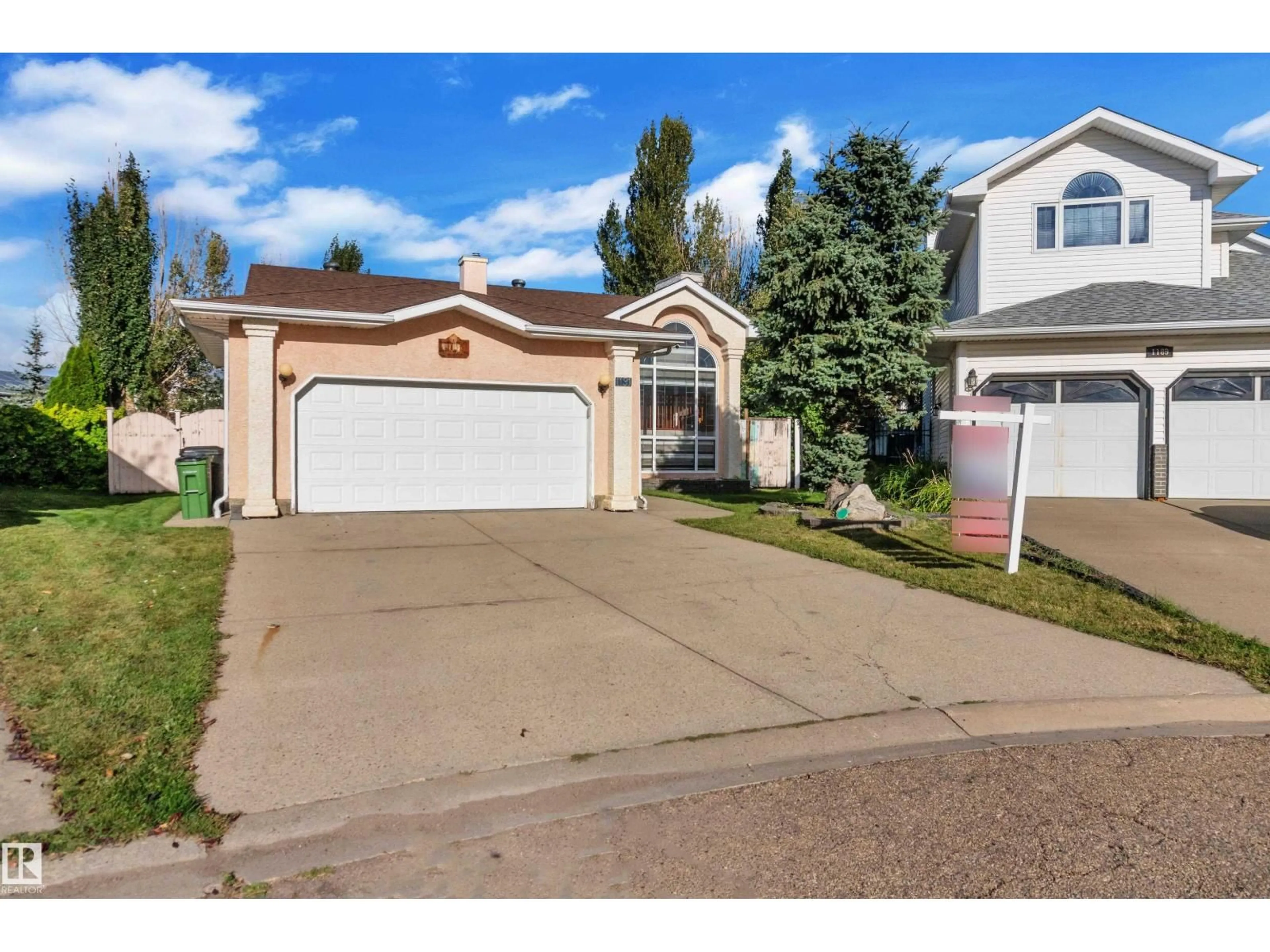 Home with vinyl exterior material, street for 1191 JOYCE RD, Edmonton Alberta T6L6V4