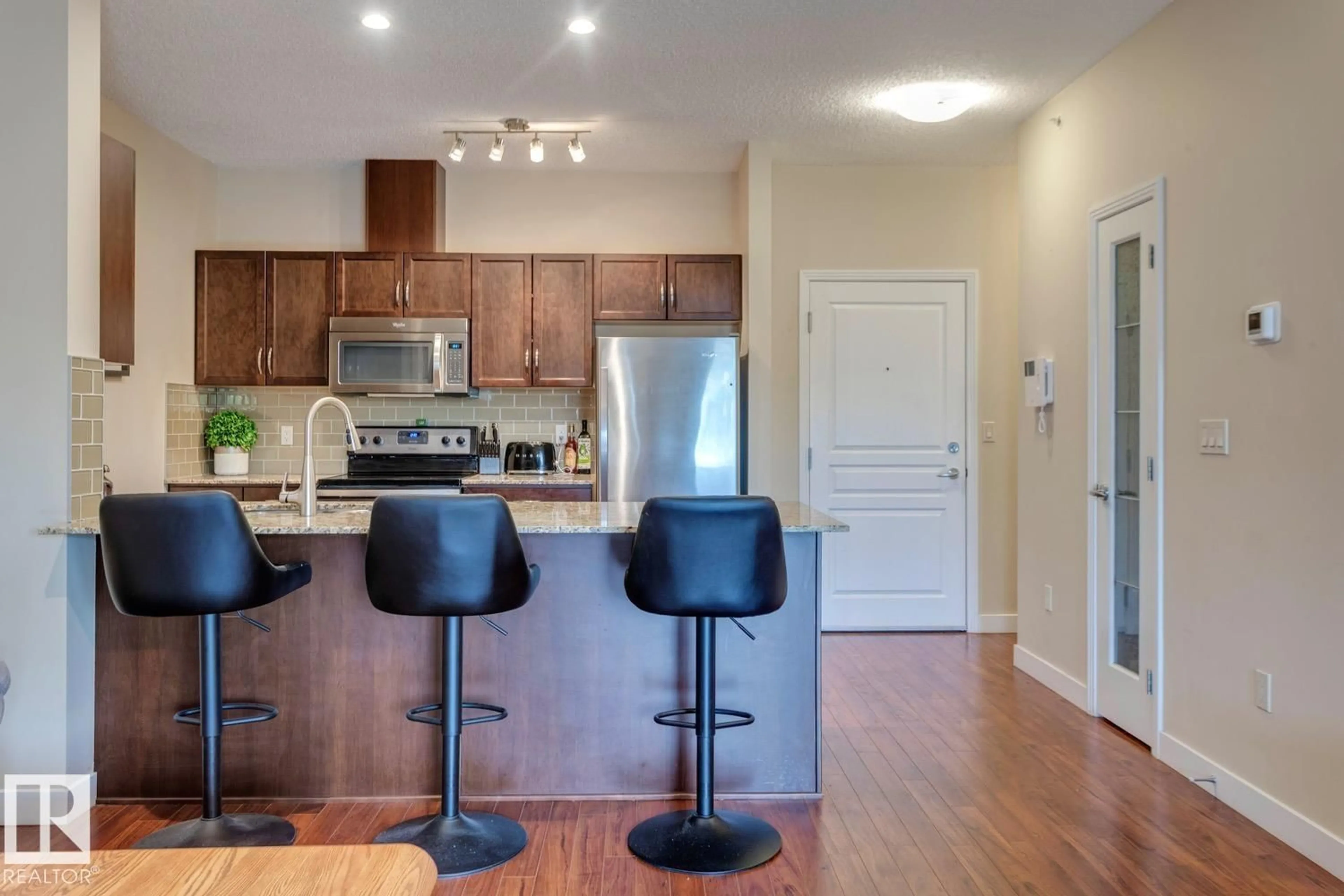 Open concept kitchen, wood/laminate floor for 2045 - 426 GRANTHAM CT, Edmonton Alberta T5T3X6