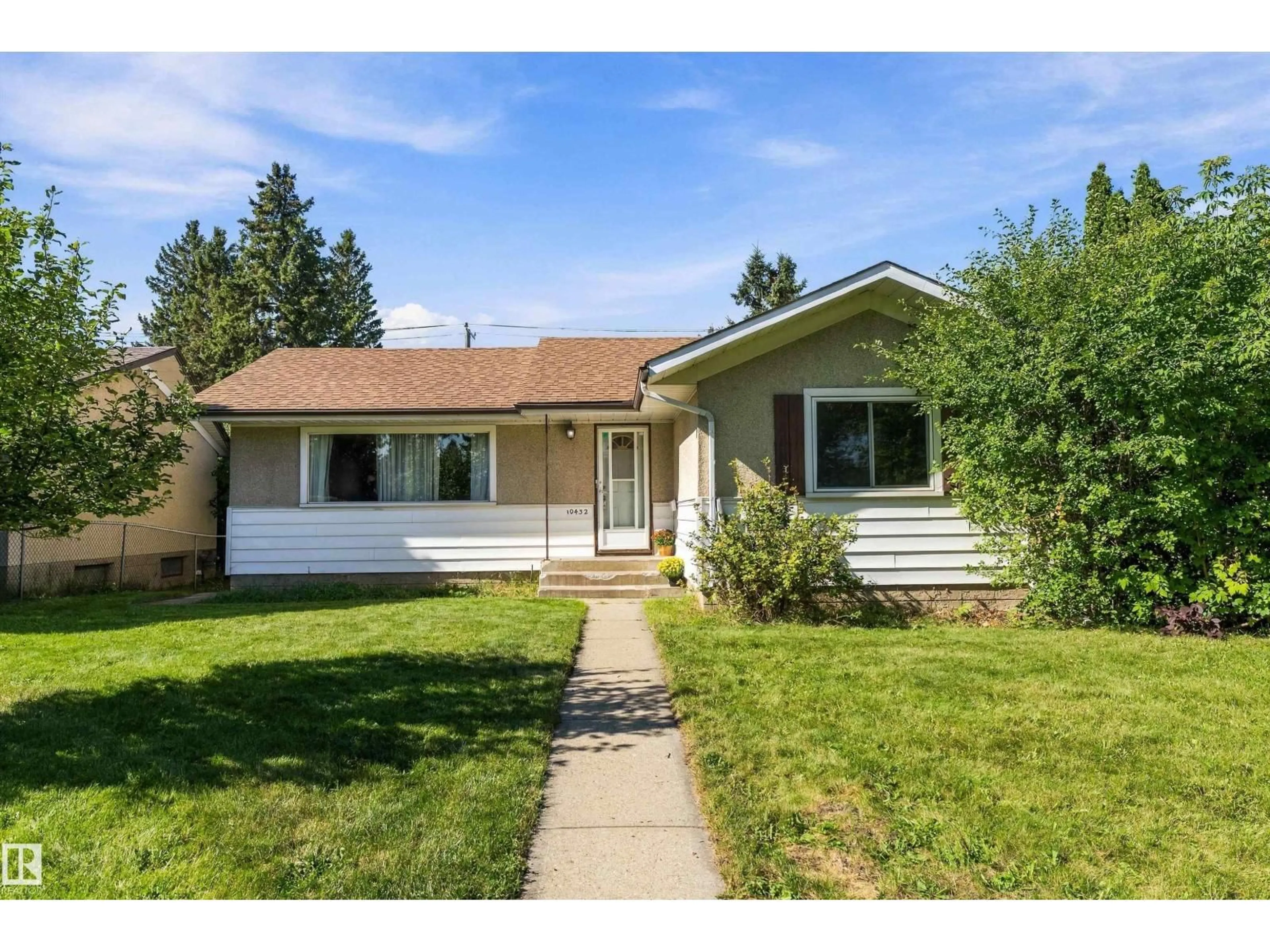 Home with vinyl exterior material, street for 10432 50 ST, Edmonton Alberta T6A2C6