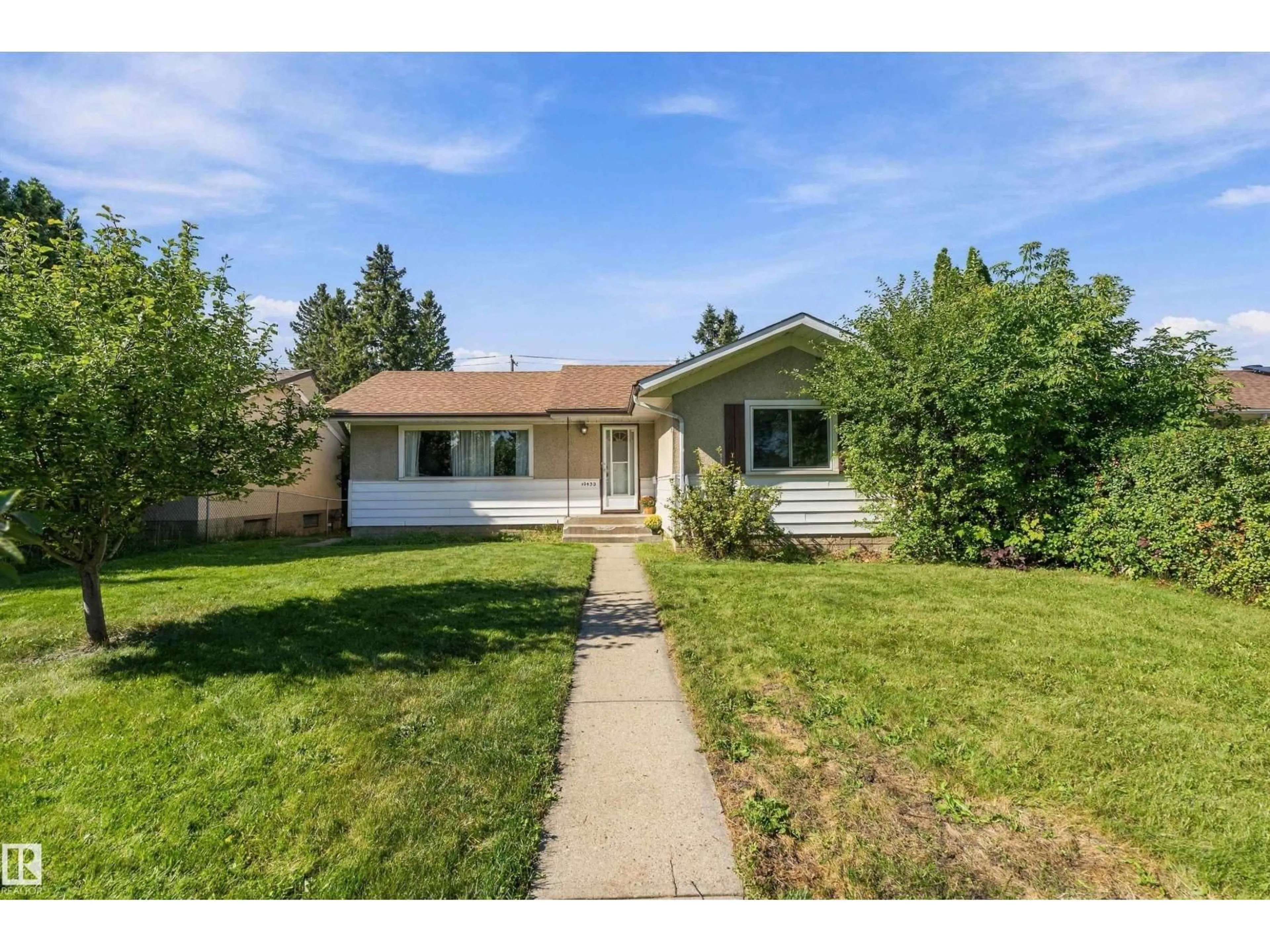 Home with vinyl exterior material, street for 10432 50 ST, Edmonton Alberta T6A2C6