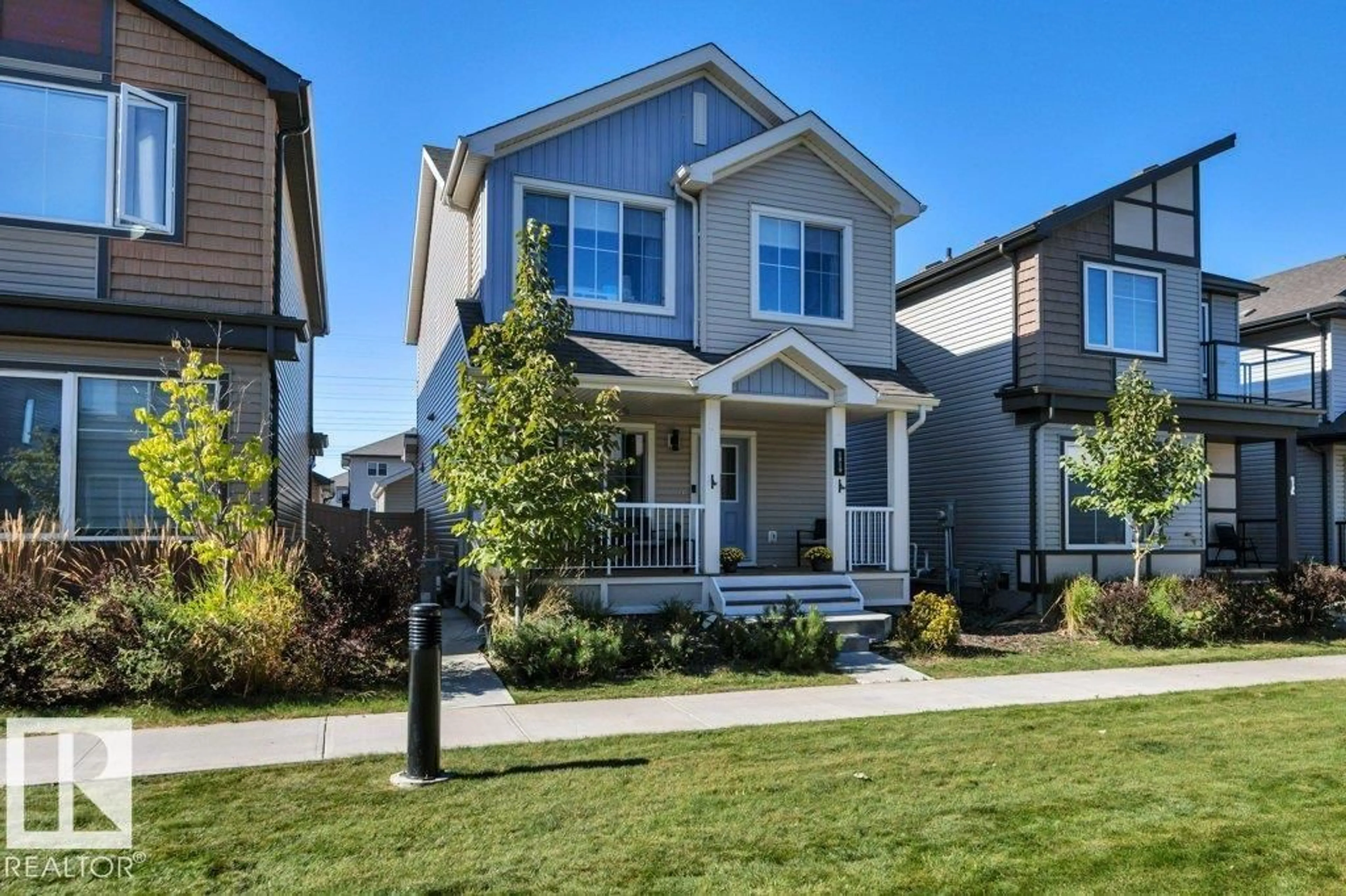 Home with vinyl exterior material, street for NW - 1819 26A ST, Edmonton Alberta T6T2H8