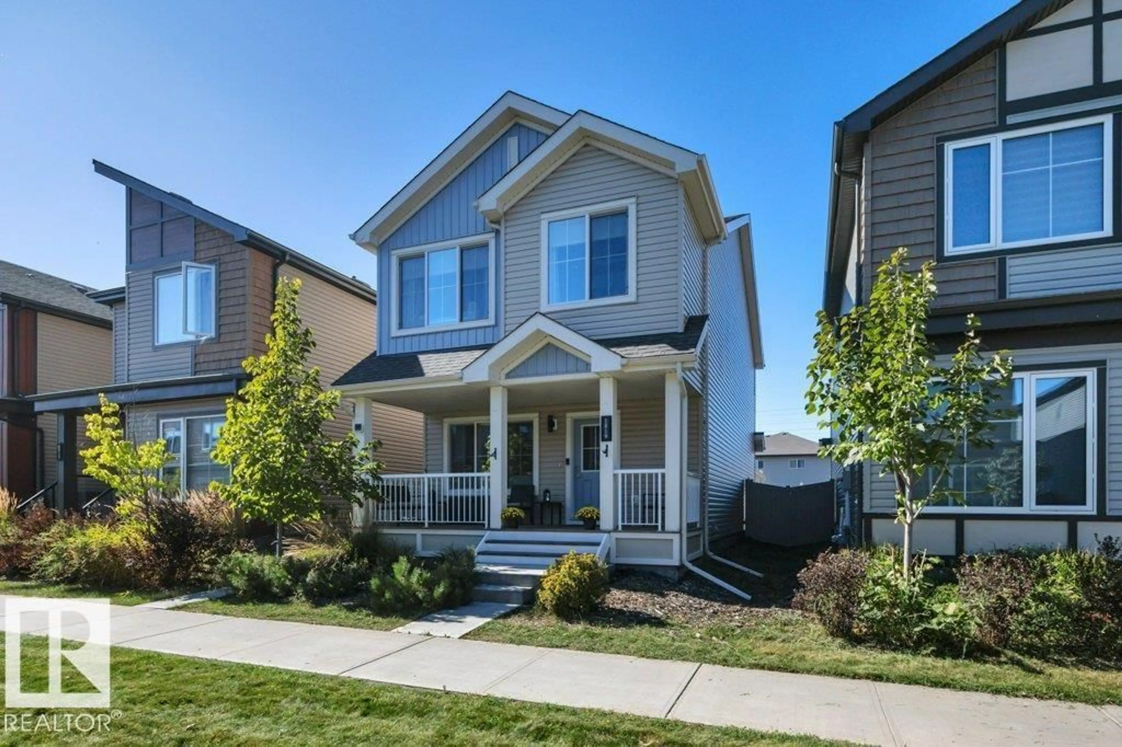 Home with vinyl exterior material, street for NW - 1819 26A ST, Edmonton Alberta T6T2H8
