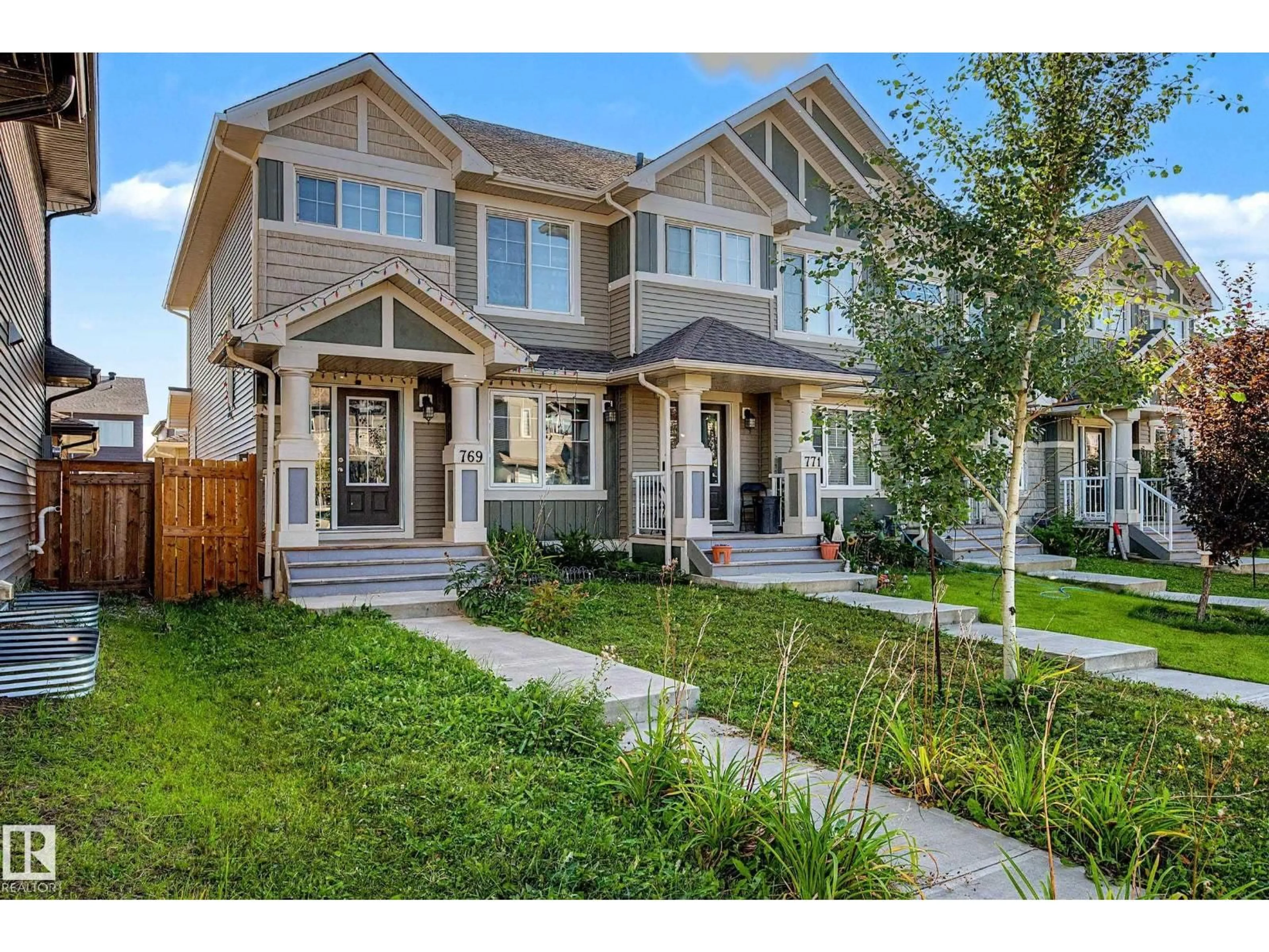 Home with vinyl exterior material, street for 769 SECORD BV, Edmonton Alberta T5T7J8