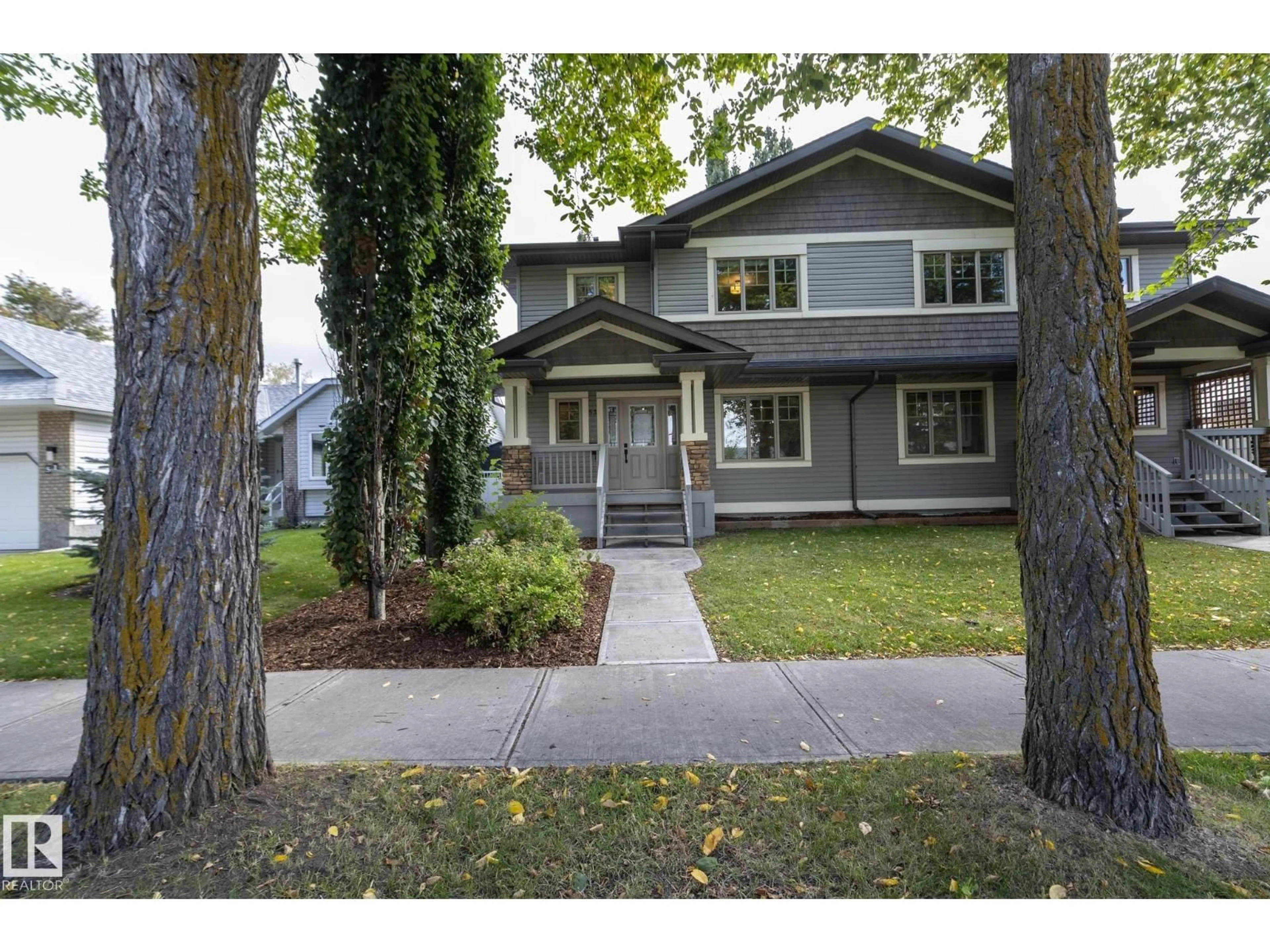Home with vinyl exterior material, street for 53/55 MICHIGAN ST, Devon Alberta T9G1H7