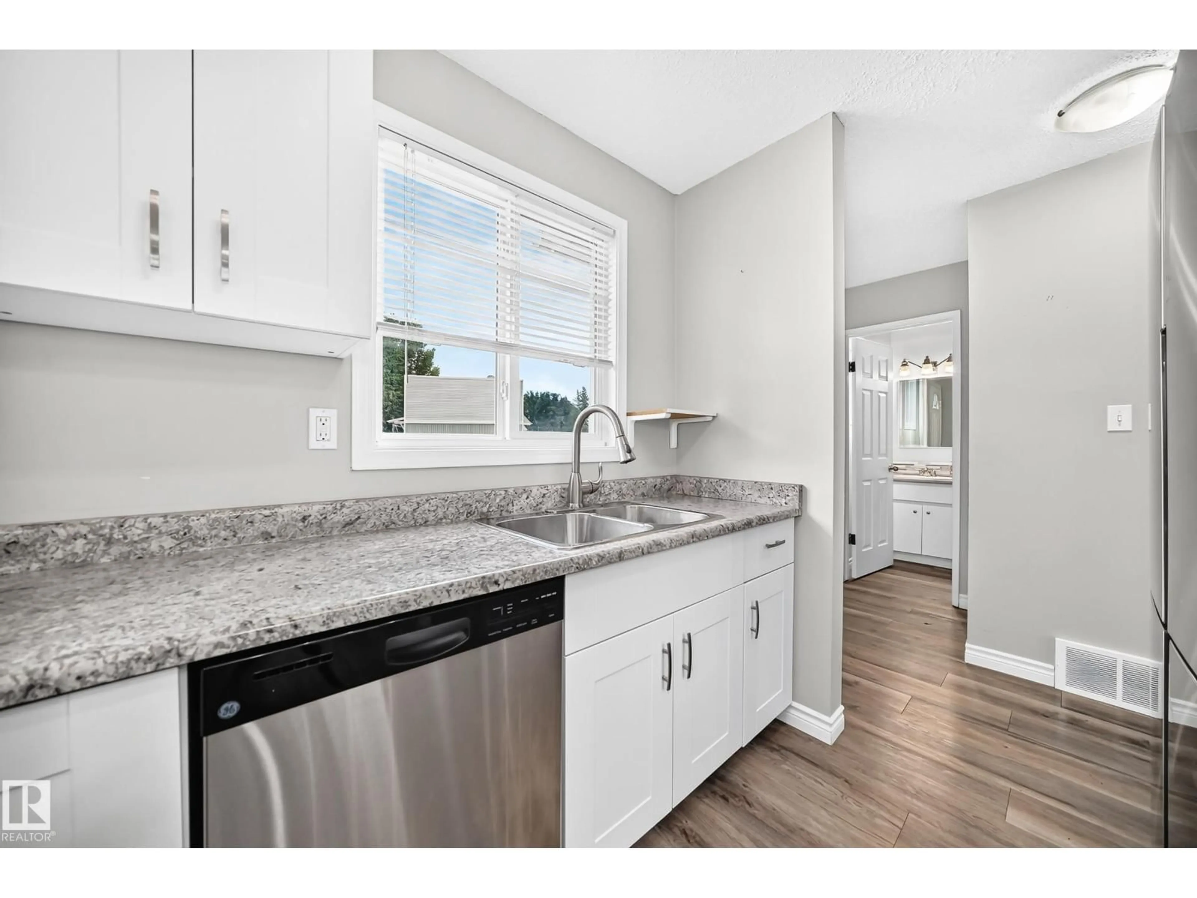 Open concept kitchen, ceramic/tile floor for 18146 81 AV, Edmonton Alberta T5T1S4