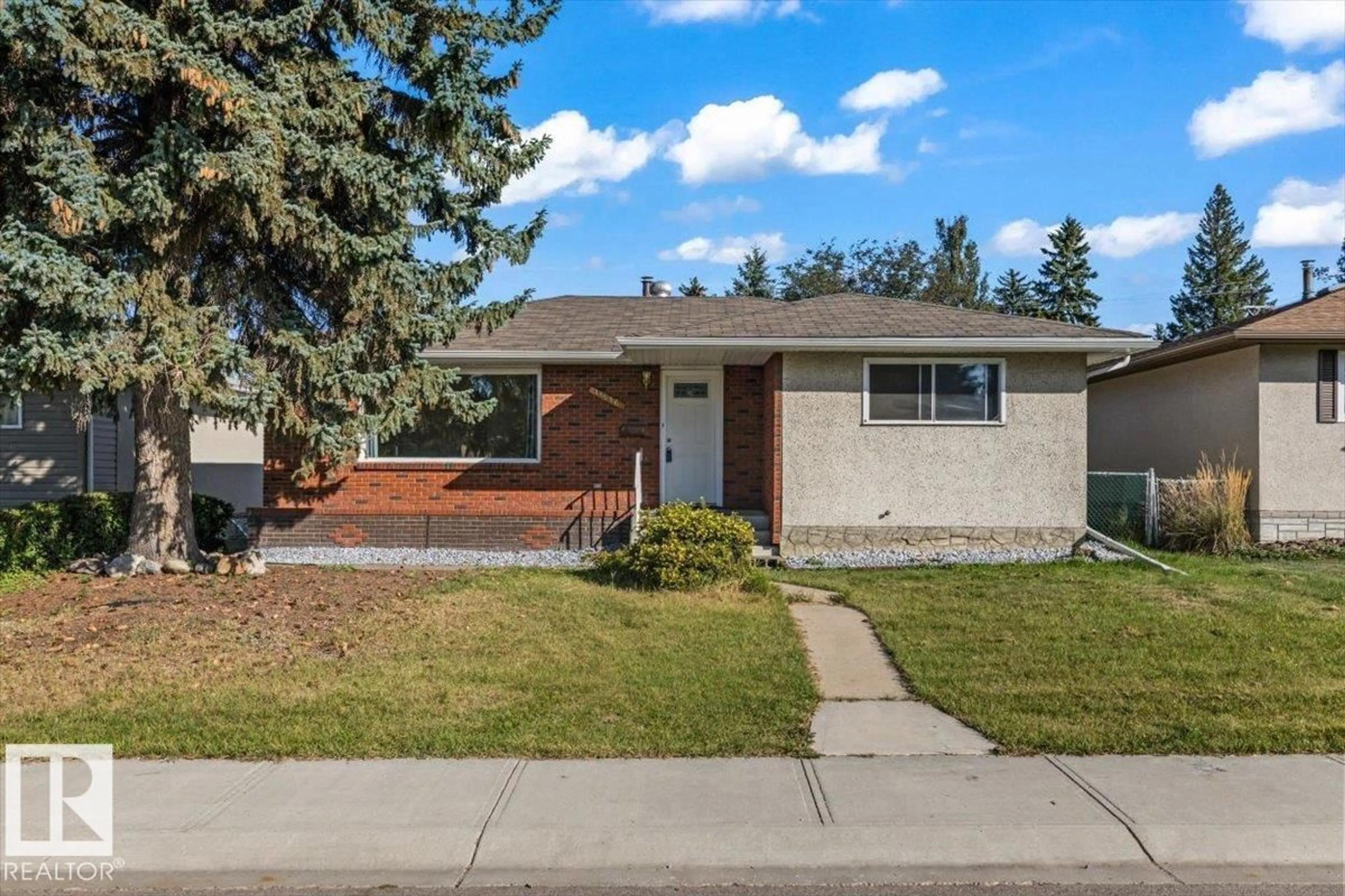 Home with brick exterior material, street for 11516 44 AV, Edmonton Alberta T6J0Z5