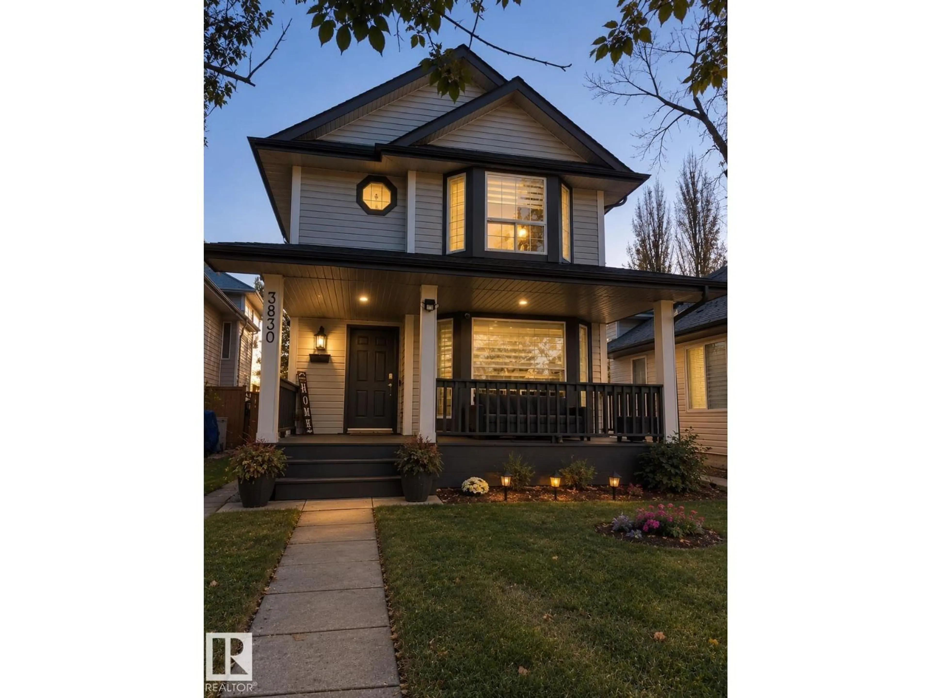 Home with vinyl exterior material, street for 3830 22 ST, Edmonton Alberta T6T1K8