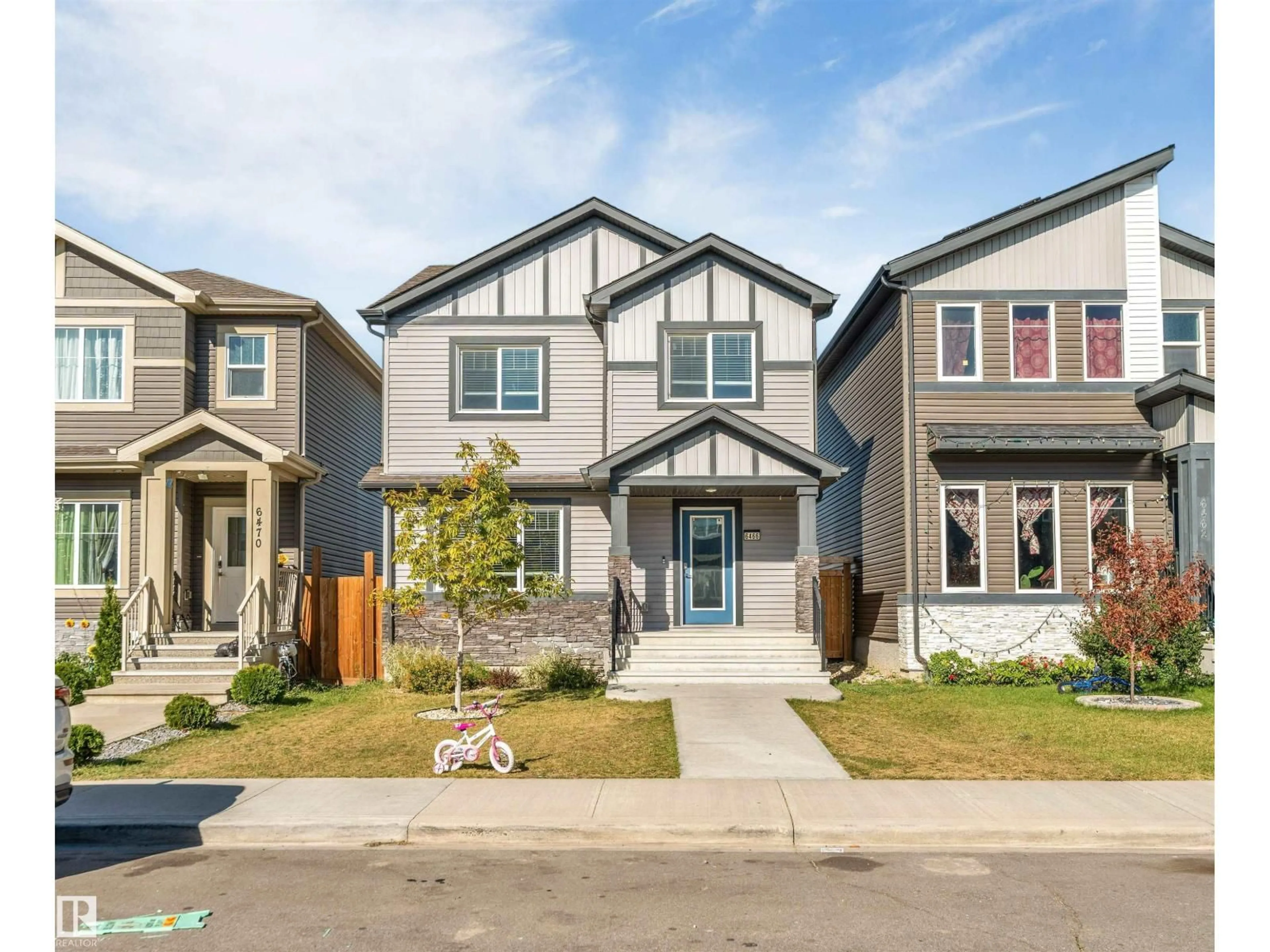 Home with vinyl exterior material, street for 6466 177A AV, Edmonton Alberta T5Y3X2