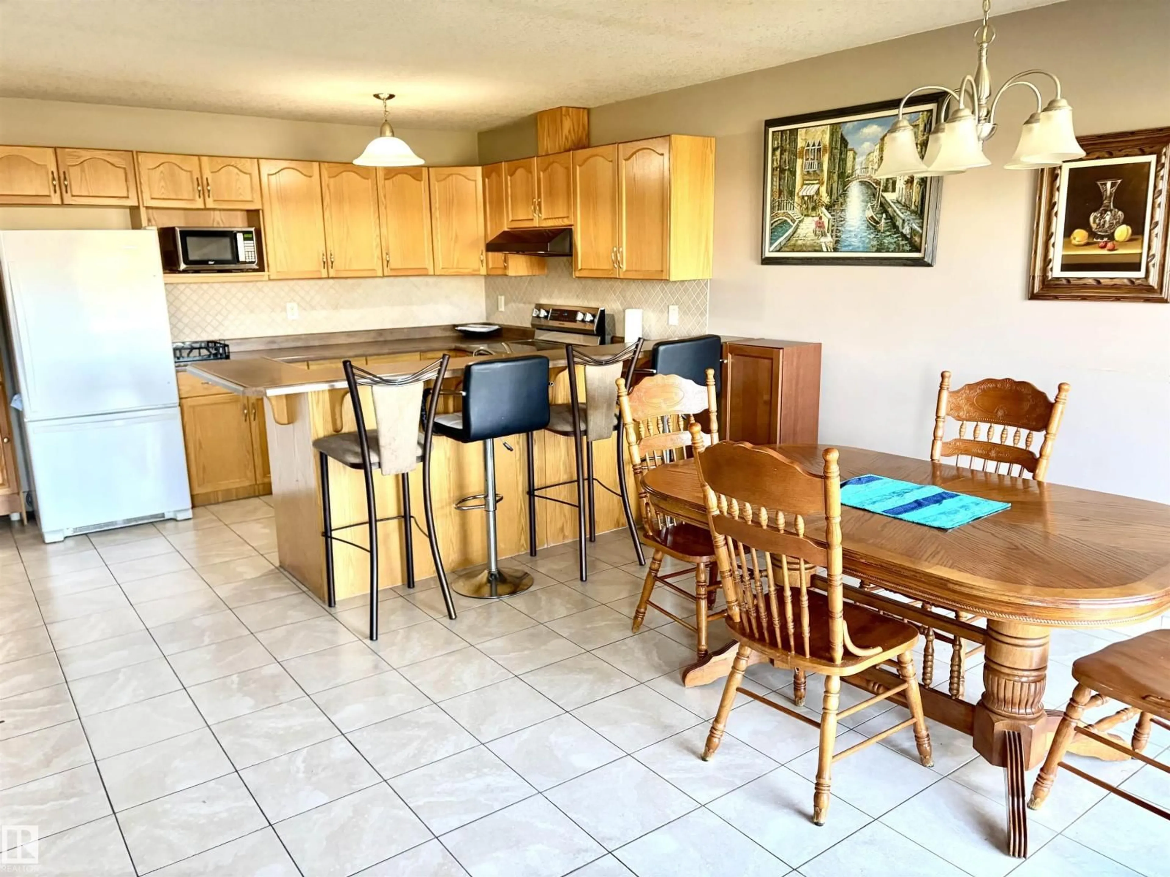 Open concept kitchen, ceramic/tile floor for #17 - 16317 64 ST, Edmonton Alberta T5Y3M3